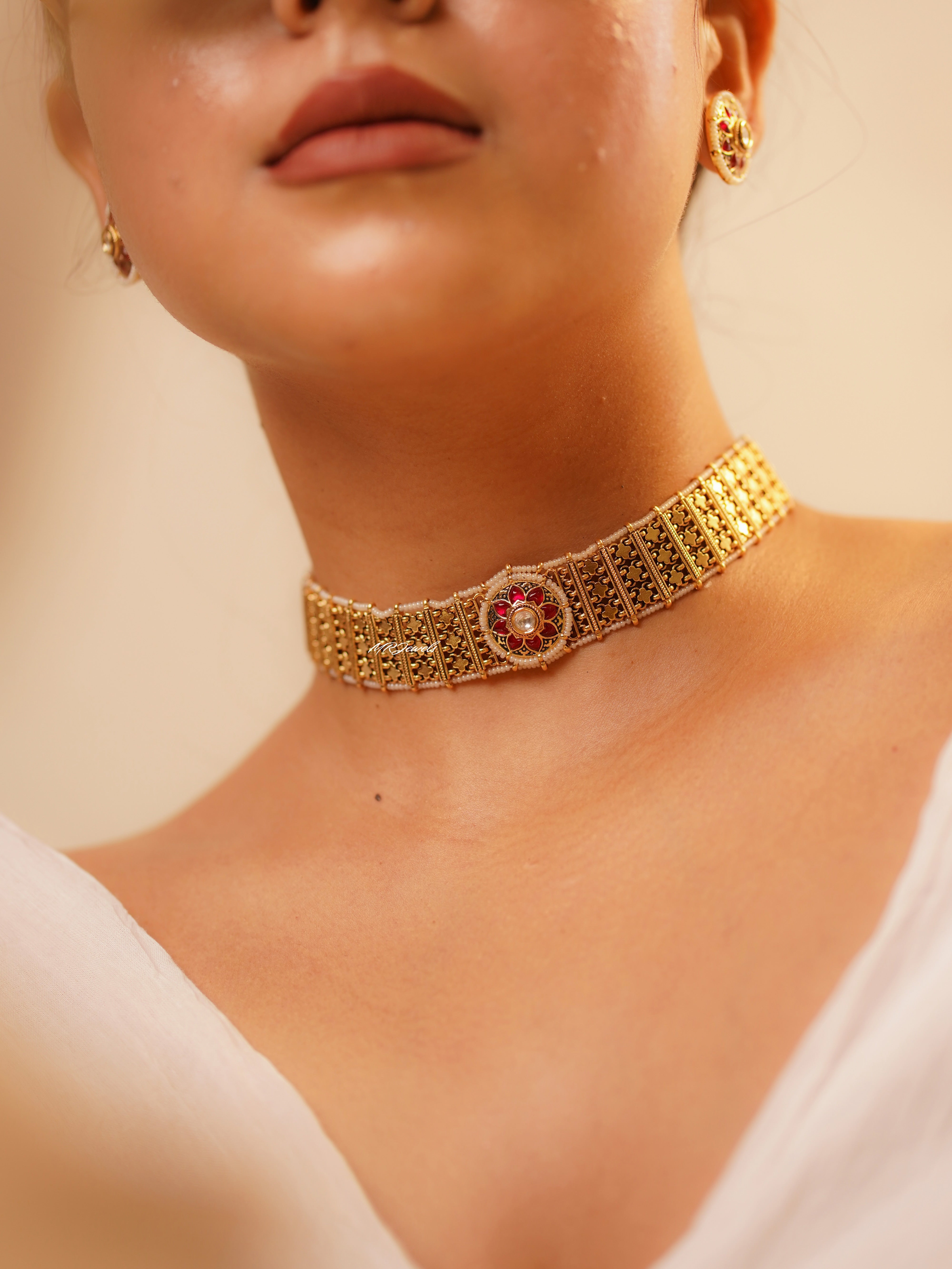 antique gold choker necklace with wide band design and high-neck style