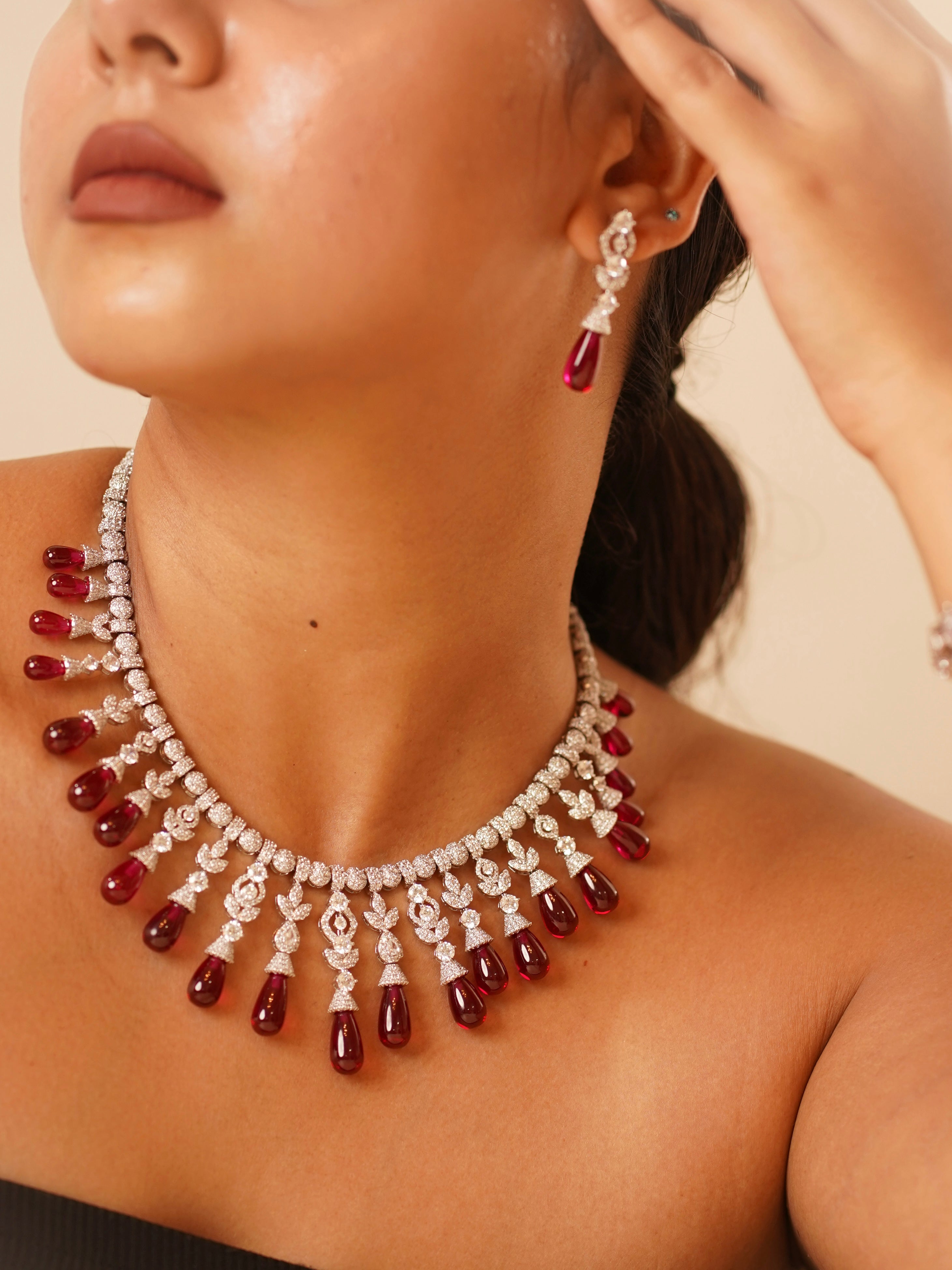 front view of scarlet red stone designer necklace with matching drop earrings