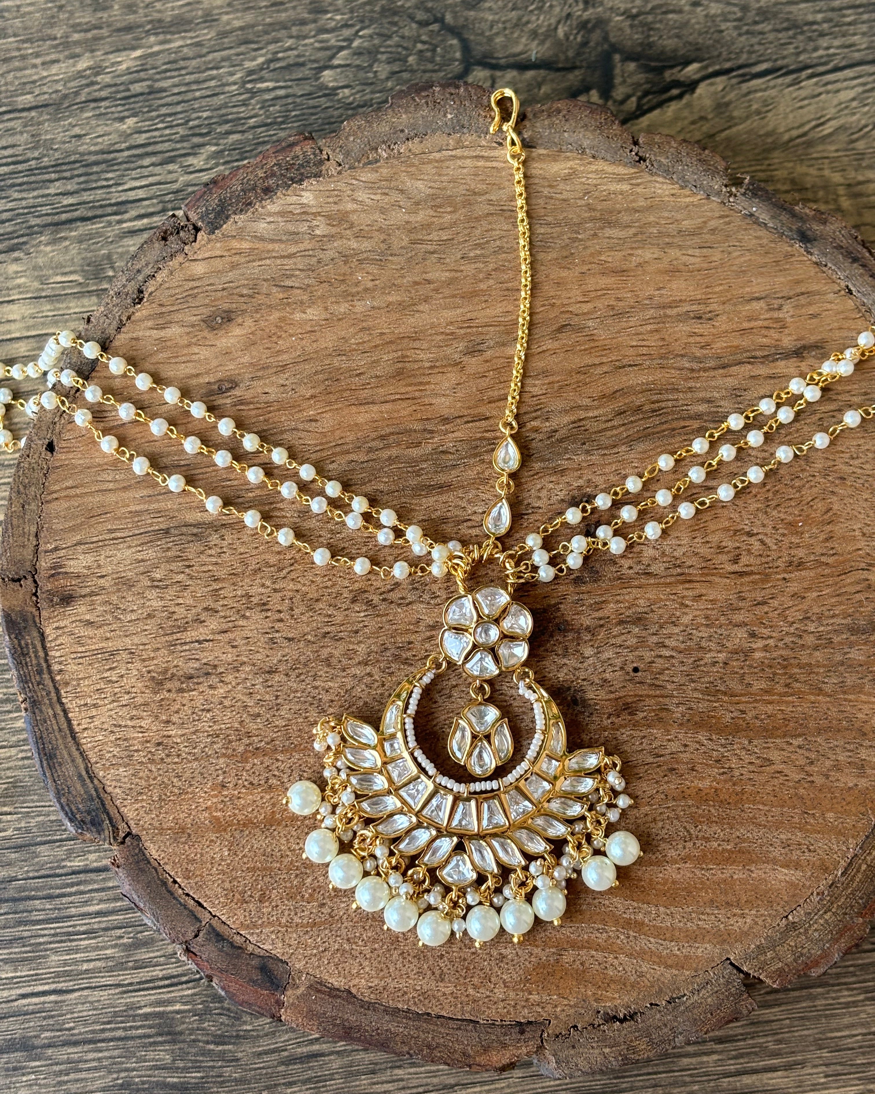 Premium kundan matha patti crafted from brass with layered stone accents