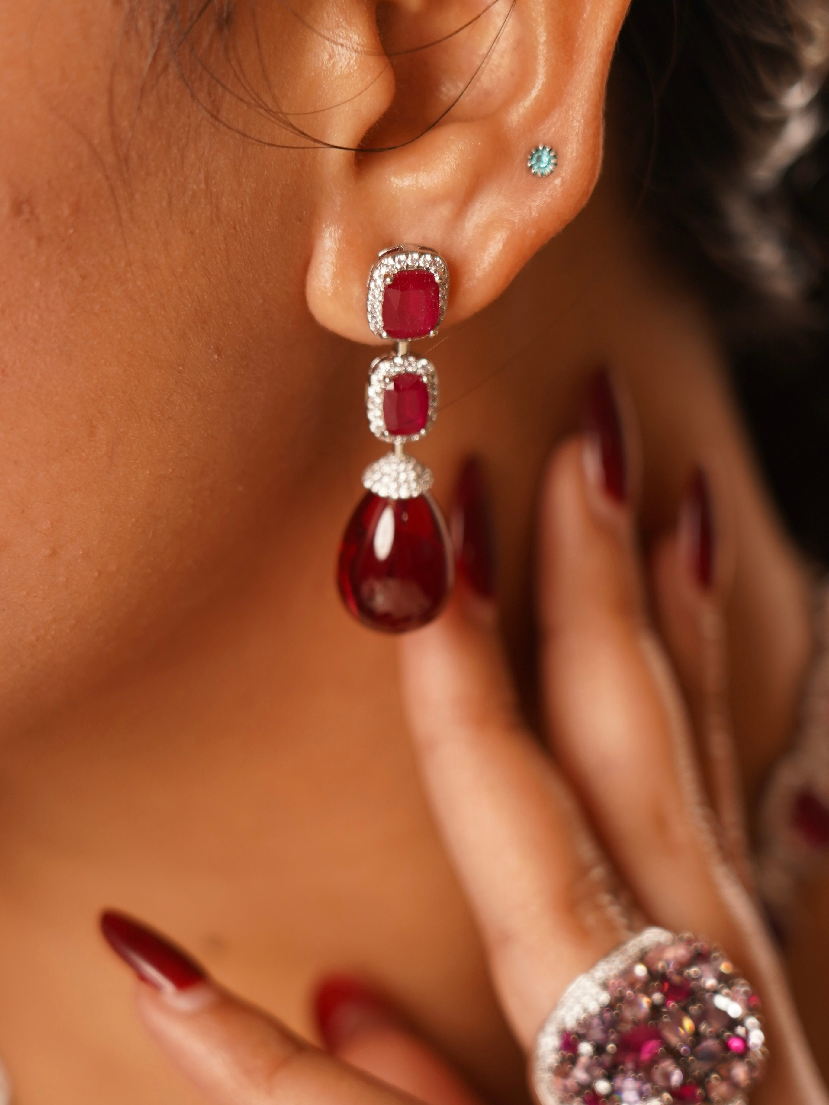 Side view of the empress ruby suite highlighting layered ruby stones and floral motifs