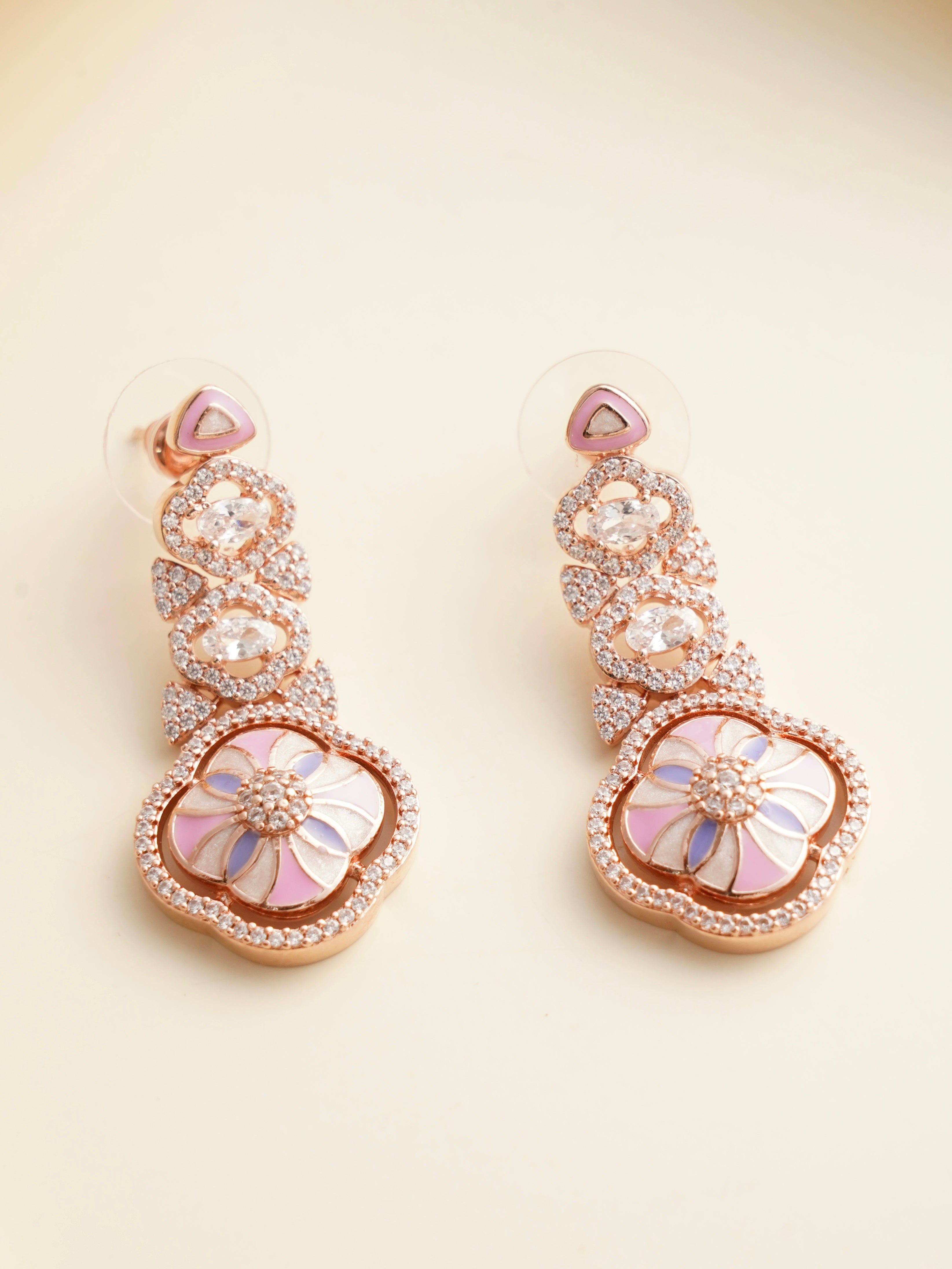 close-up of blush petals necklace highlighting lilac enamel work and crystal accents