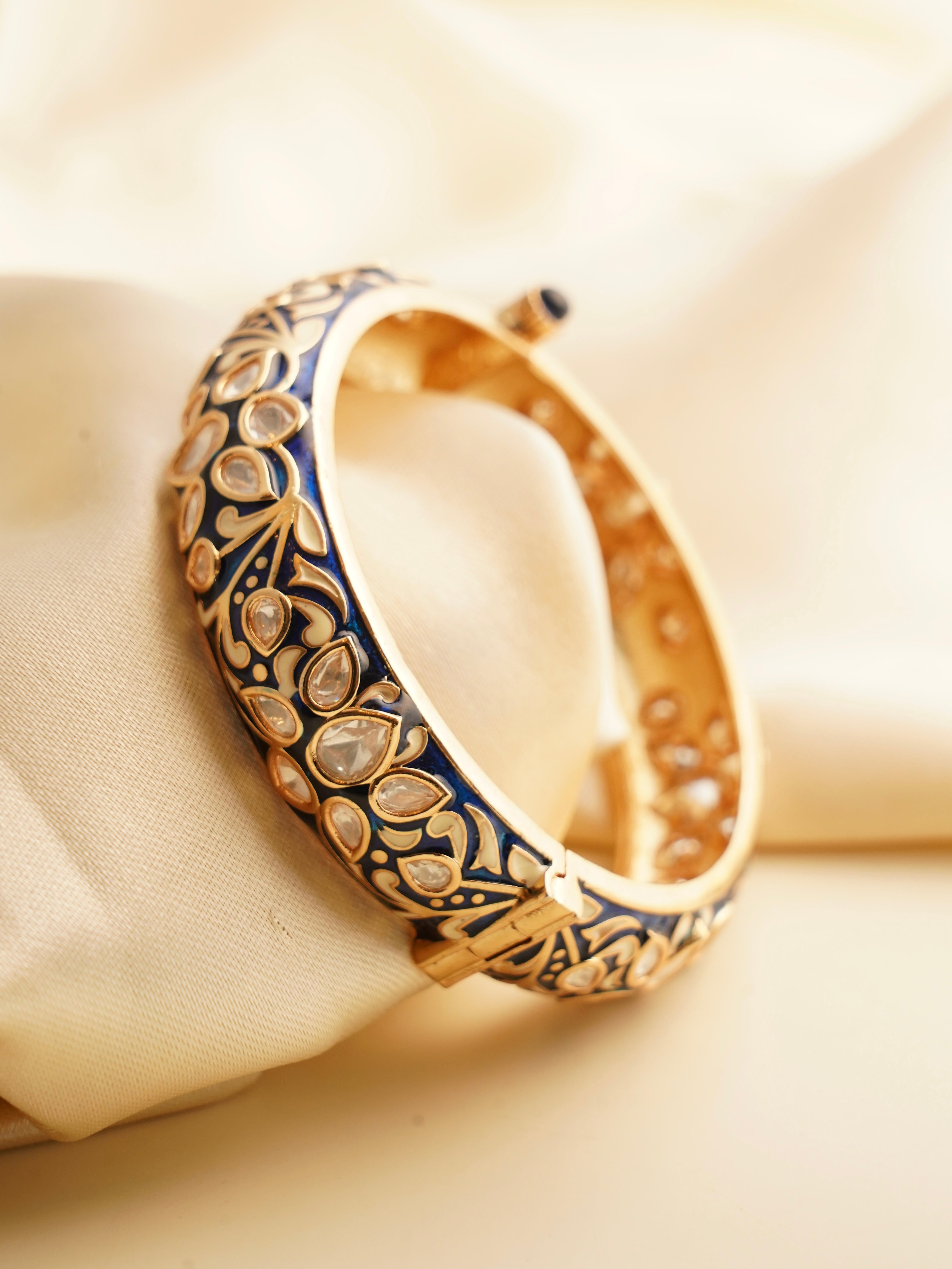 Side view of royal meenakari kada featuring colorful patterns and stone accents