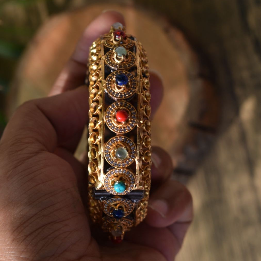 Multicolored bangles made with silver alloy and openable clasp, front view