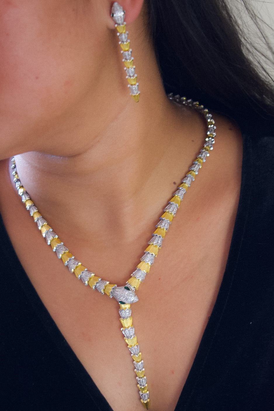 Platinum-toned necklace set with textured silver alloy and matching earrings