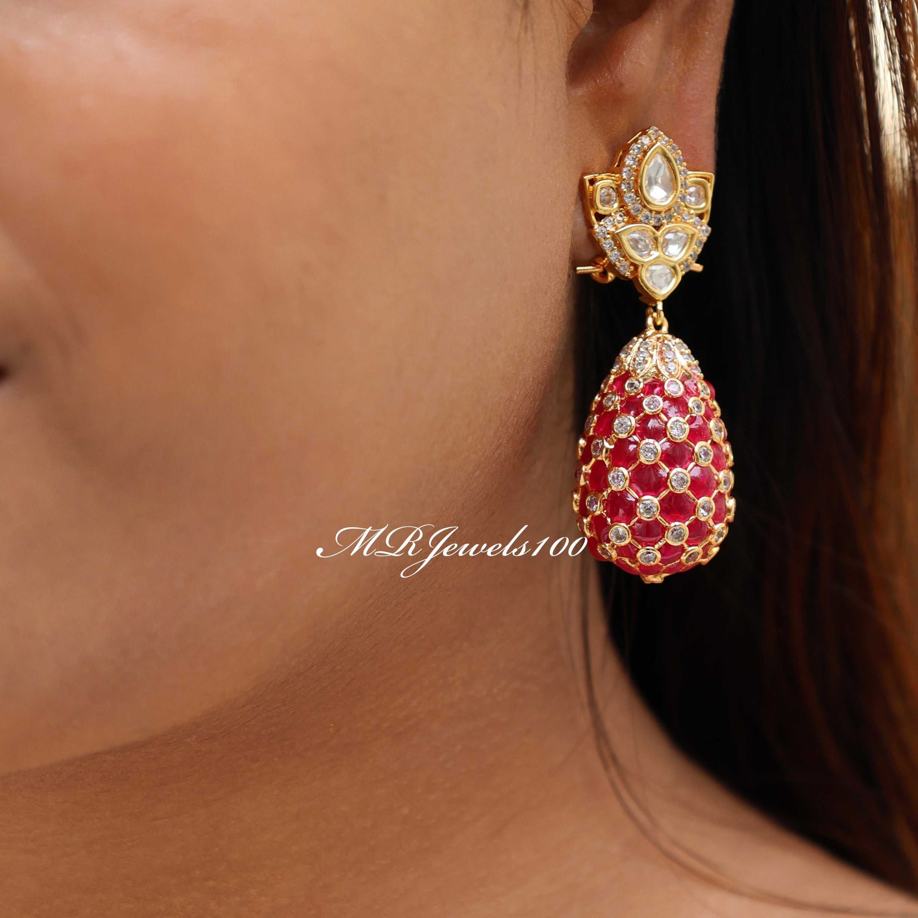 back view of indian-style polki earrings with push-back closure