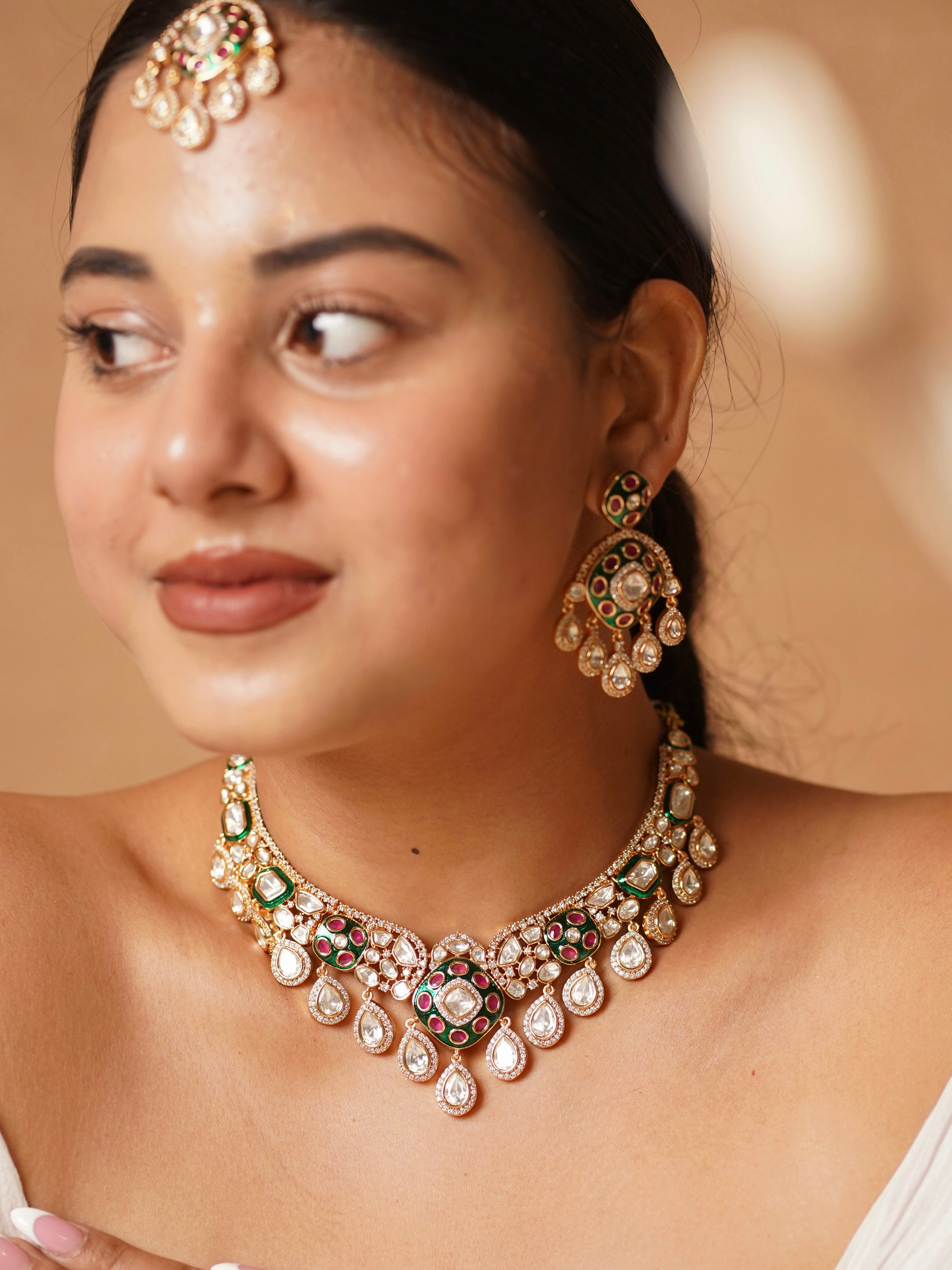 Top view of kundan meenakari set showing colorful detailing and intricate design