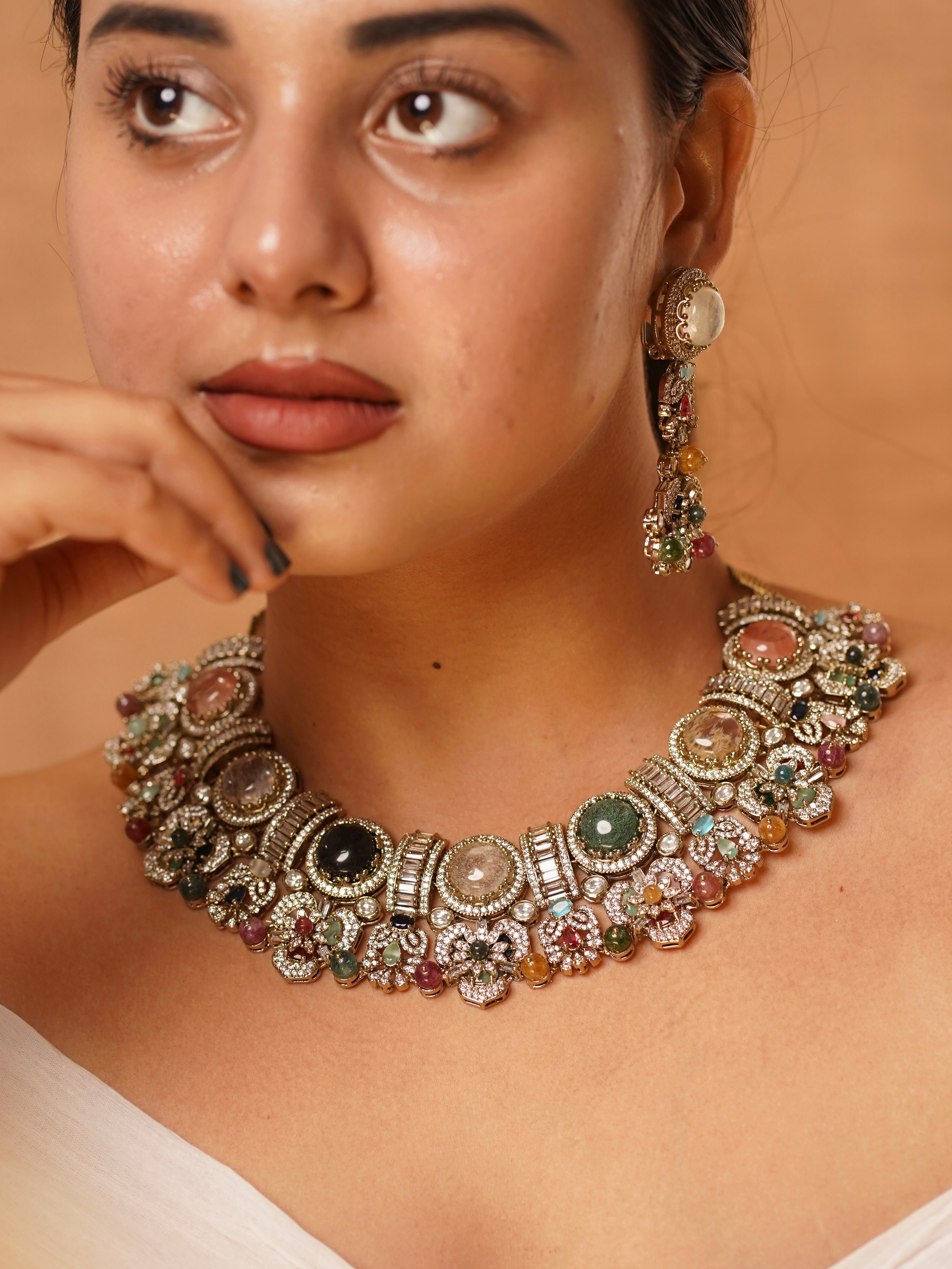 Sabya-inspired necklace set with kundan, polki and tourmaline gemstones in traditional royal arrangement