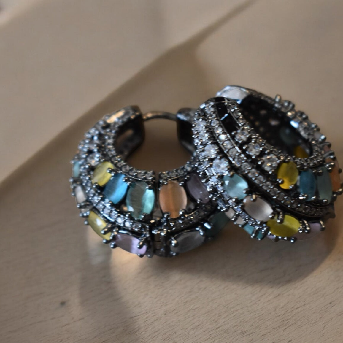 Rear close-up highlighting hoop clasp and traditional styling