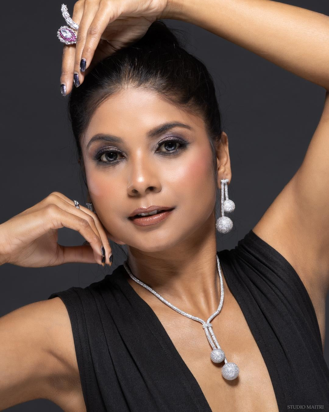 Drop diamond necklace set with silver plated finish and intricate stonework