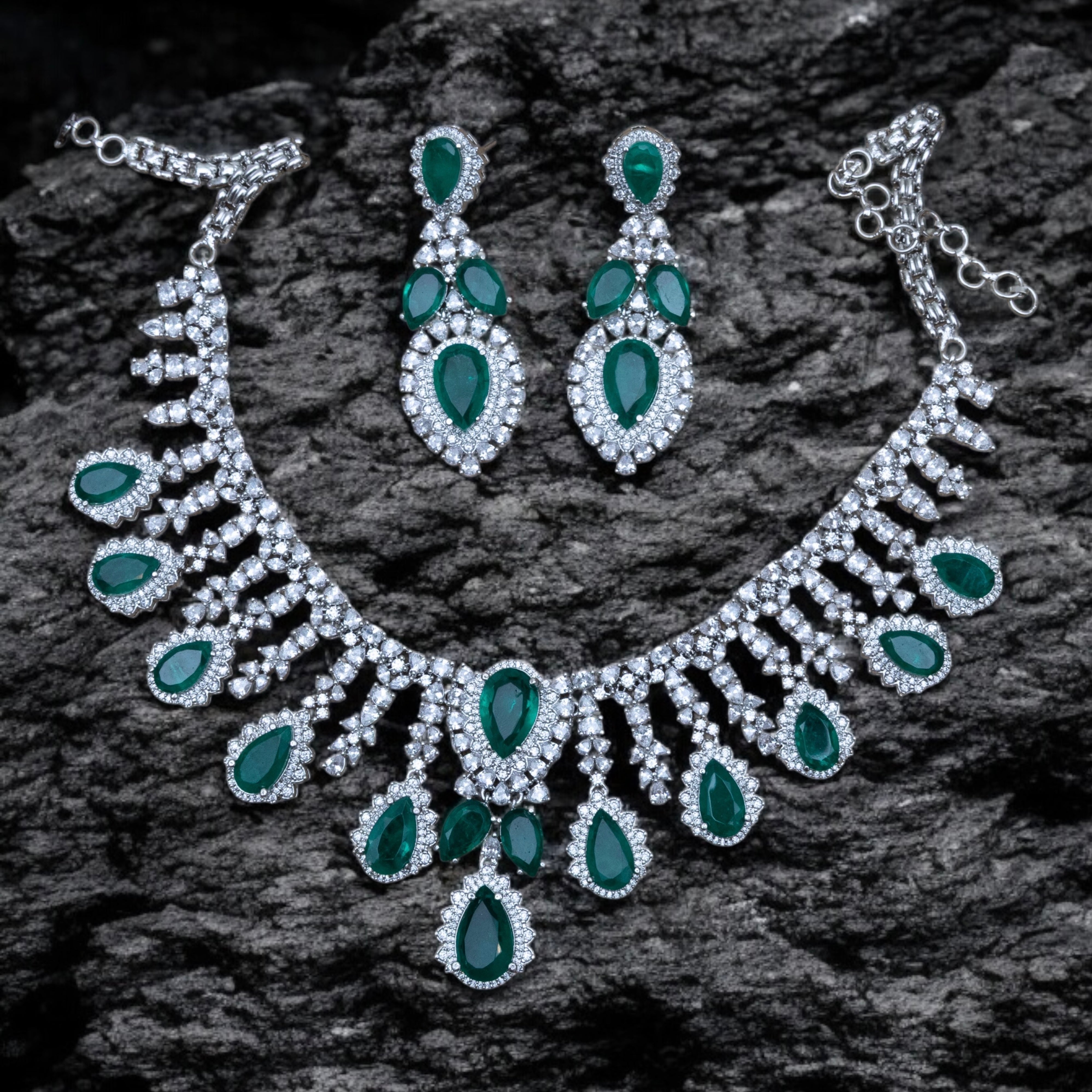 Side angle view of emerald jewellery set showcasing intricate craftsmanship