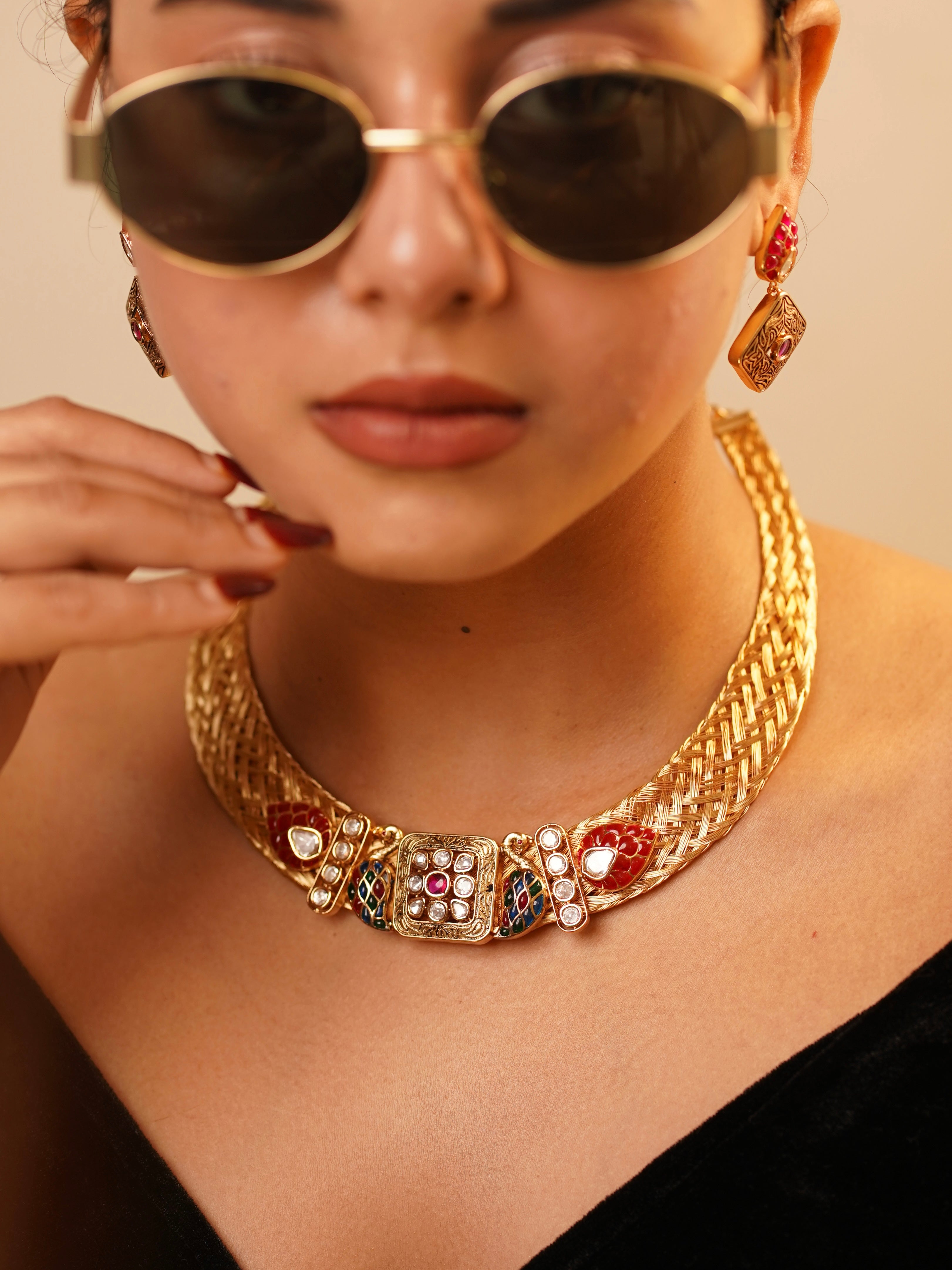 Handcrafted sapphire-toned necklace set with white stone mesh design and earrings