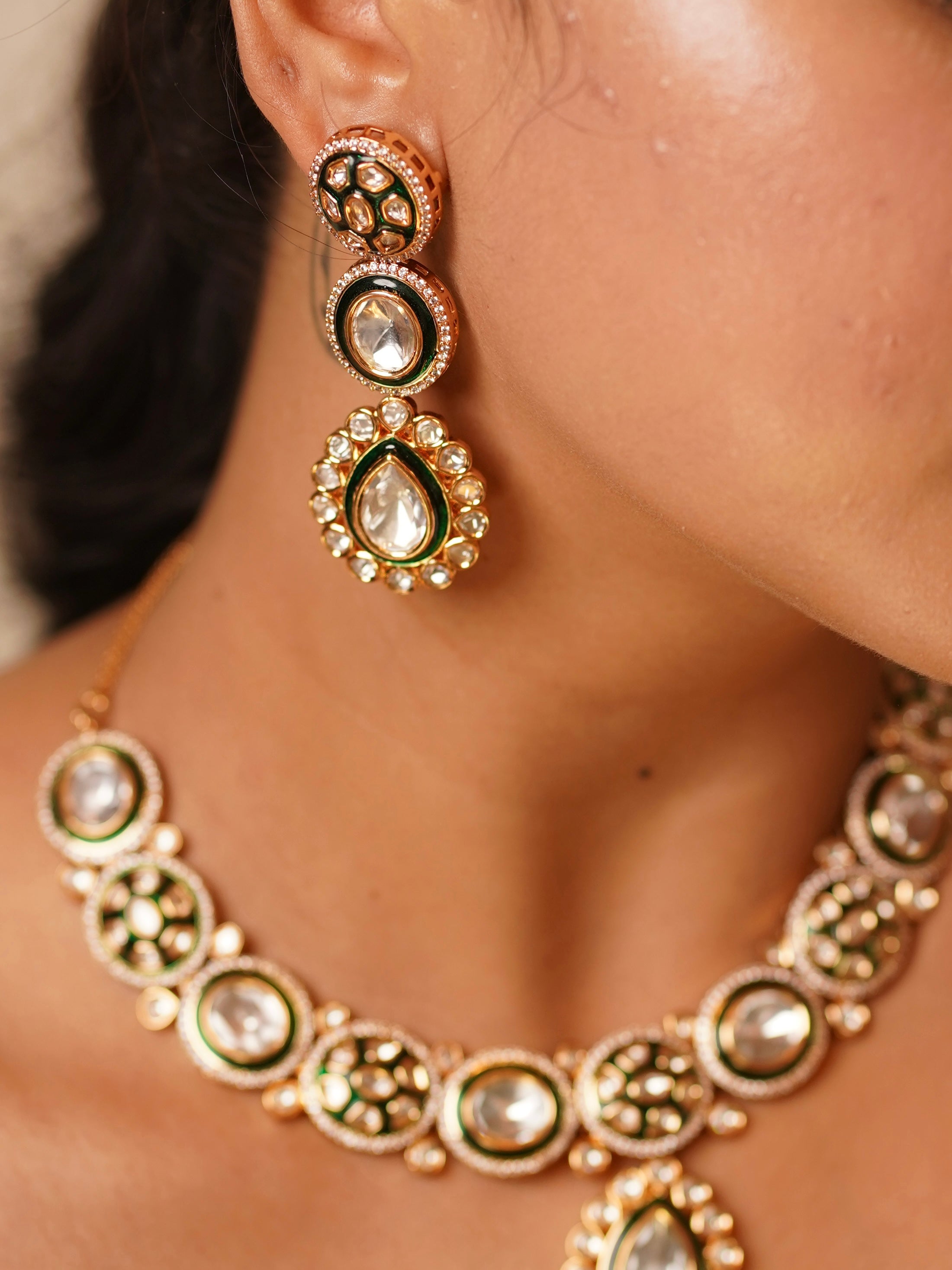 Angled view of eternal grace set with traditional polki stones and matching accessories