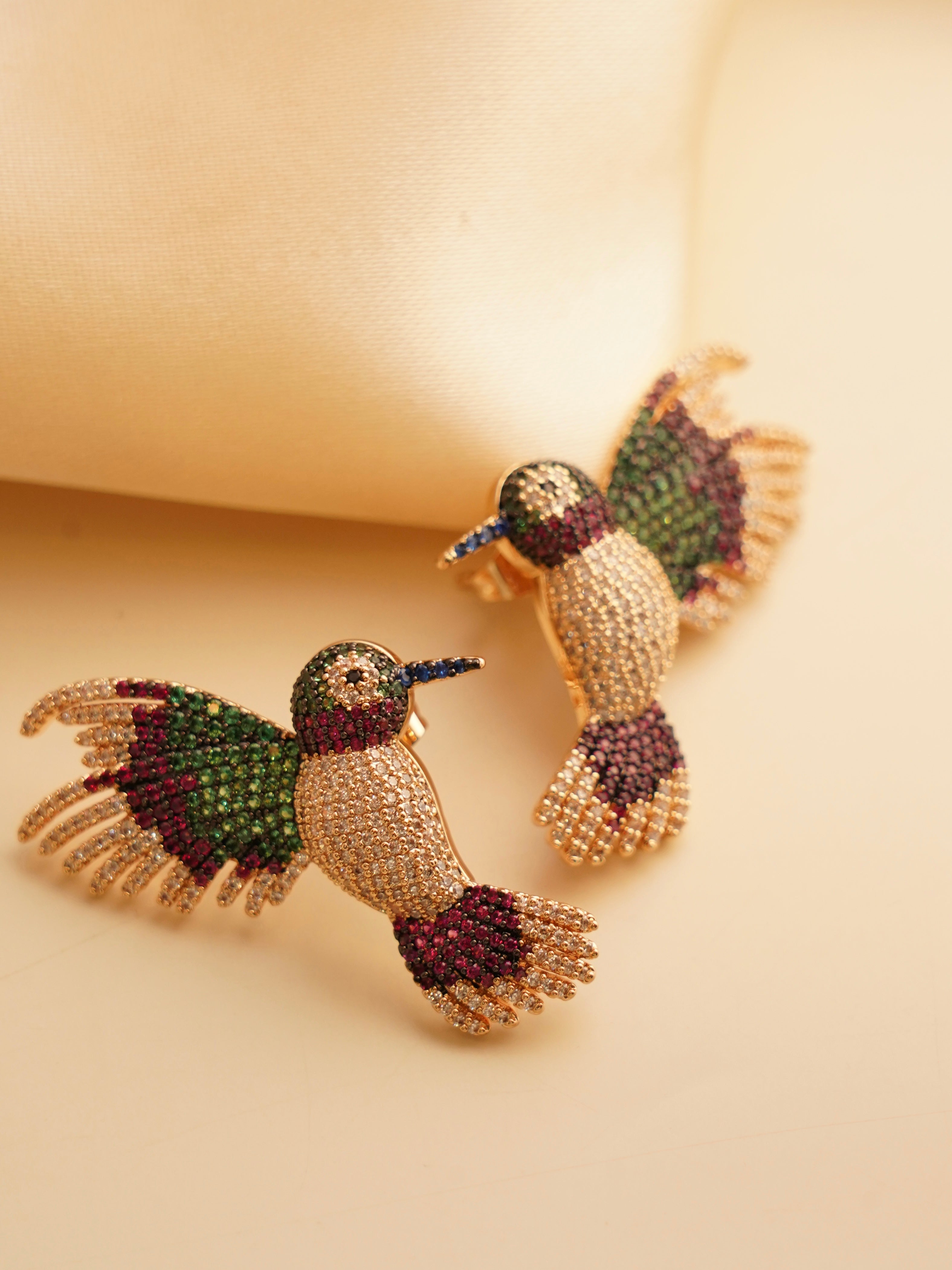 Lightweight rhodium-plated earrings with hand-set detailing in front view