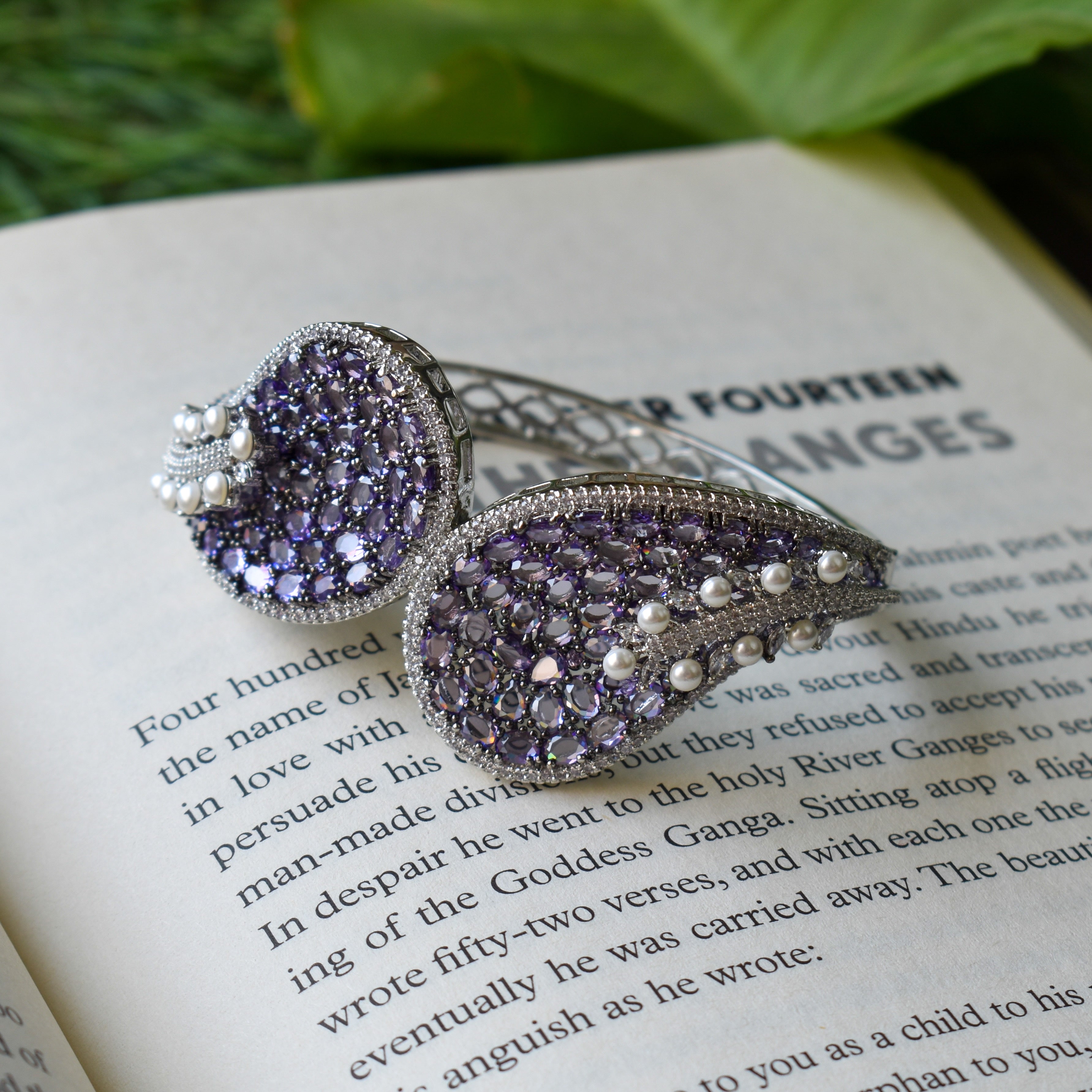 Front view of rose-cut diamond openable bracelet with high-shine finish and detailed stones