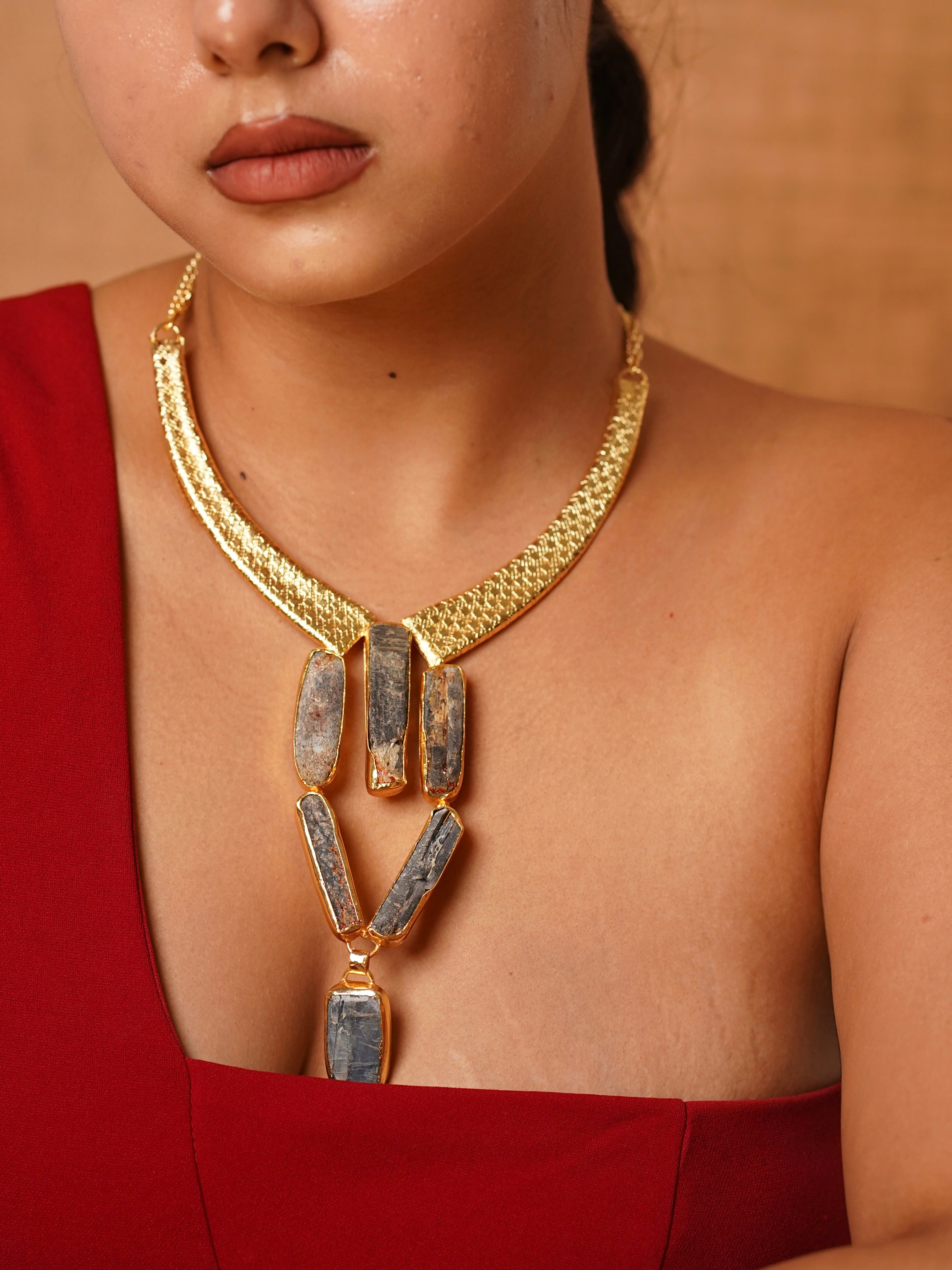 Side angle of luxe apatite collar necklace with chunky raw stone design