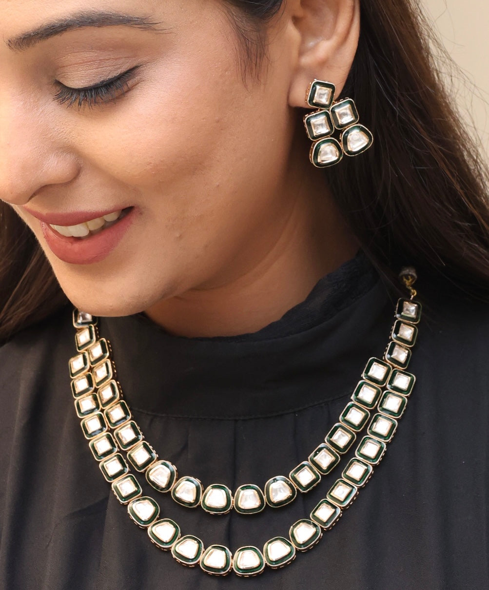 Side view of layered polki necklace with lustrous gold plating and intricate chainwork