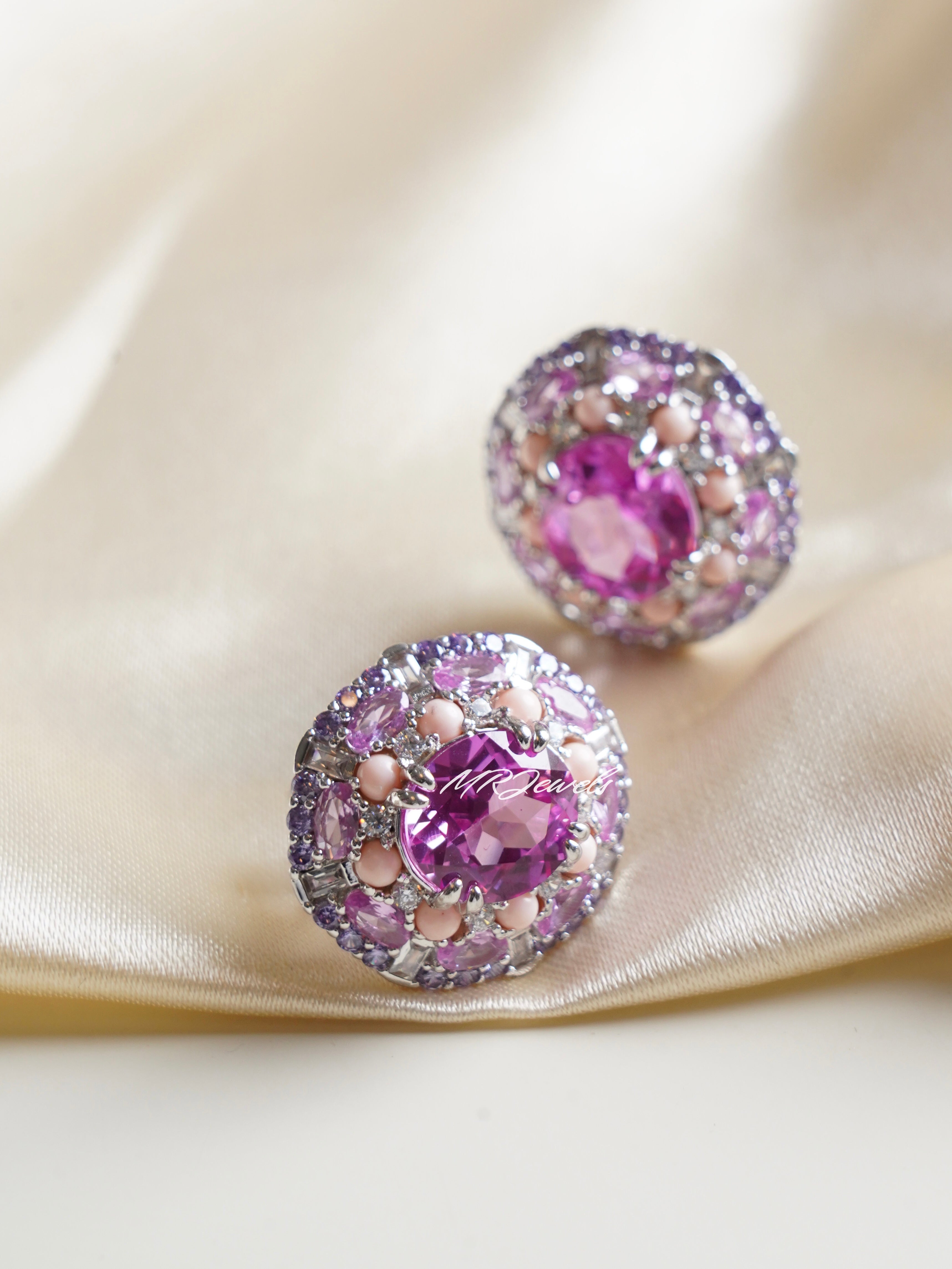 Swarovski crystal studs with platinum finish and round-cut design featuring 1-inch clip size