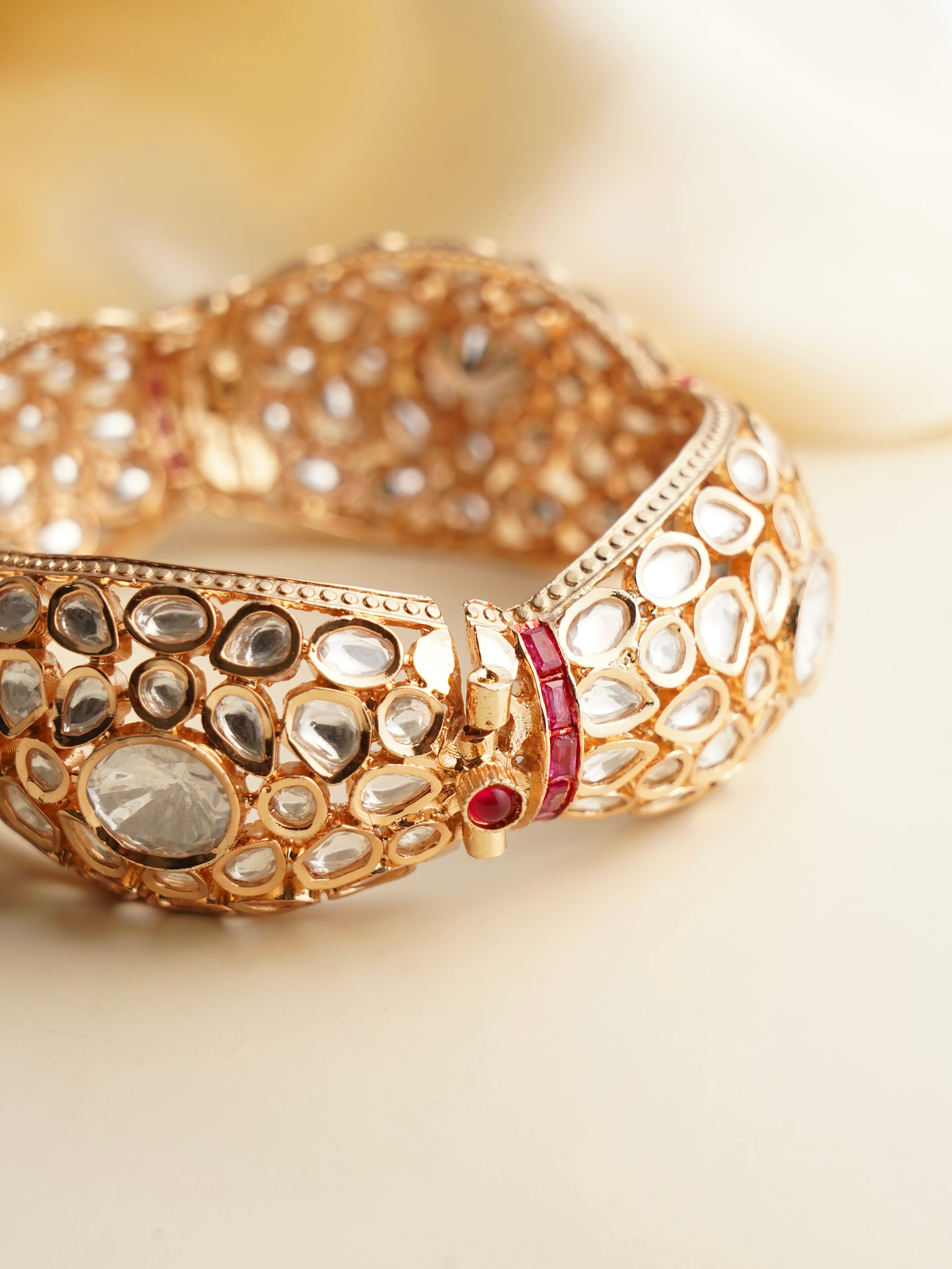 Polki-studded heritage kada with kundan artistry and gold-plated openable brass frame