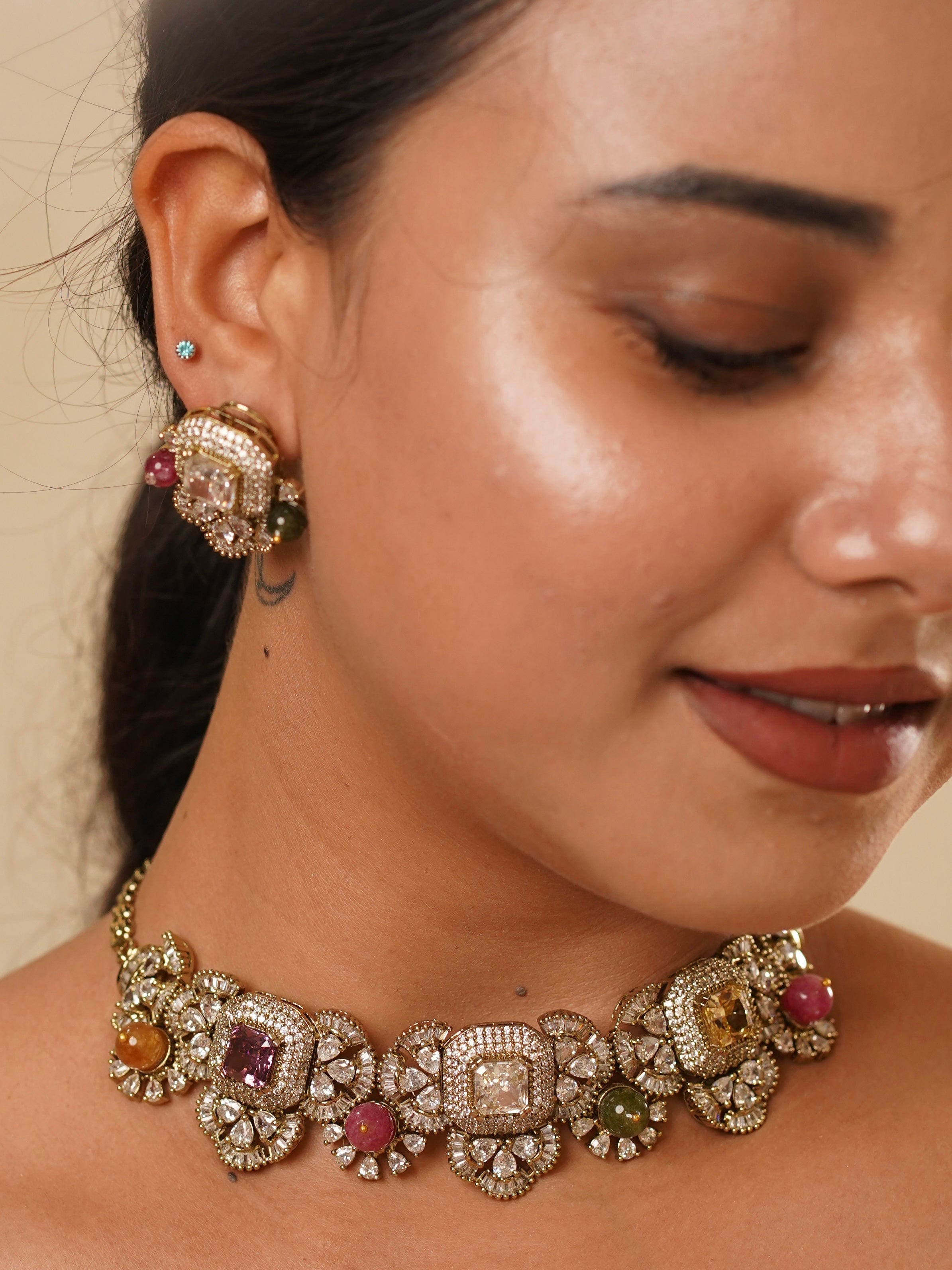 Multi-gemstone necklace with rich gold polish and sabya-inspired craftsmanship