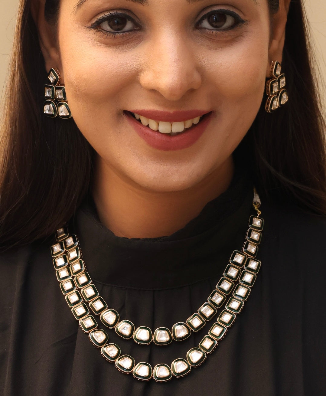 Double-layered necklace with polki stones, gold foiling and handcrafted pendant detail