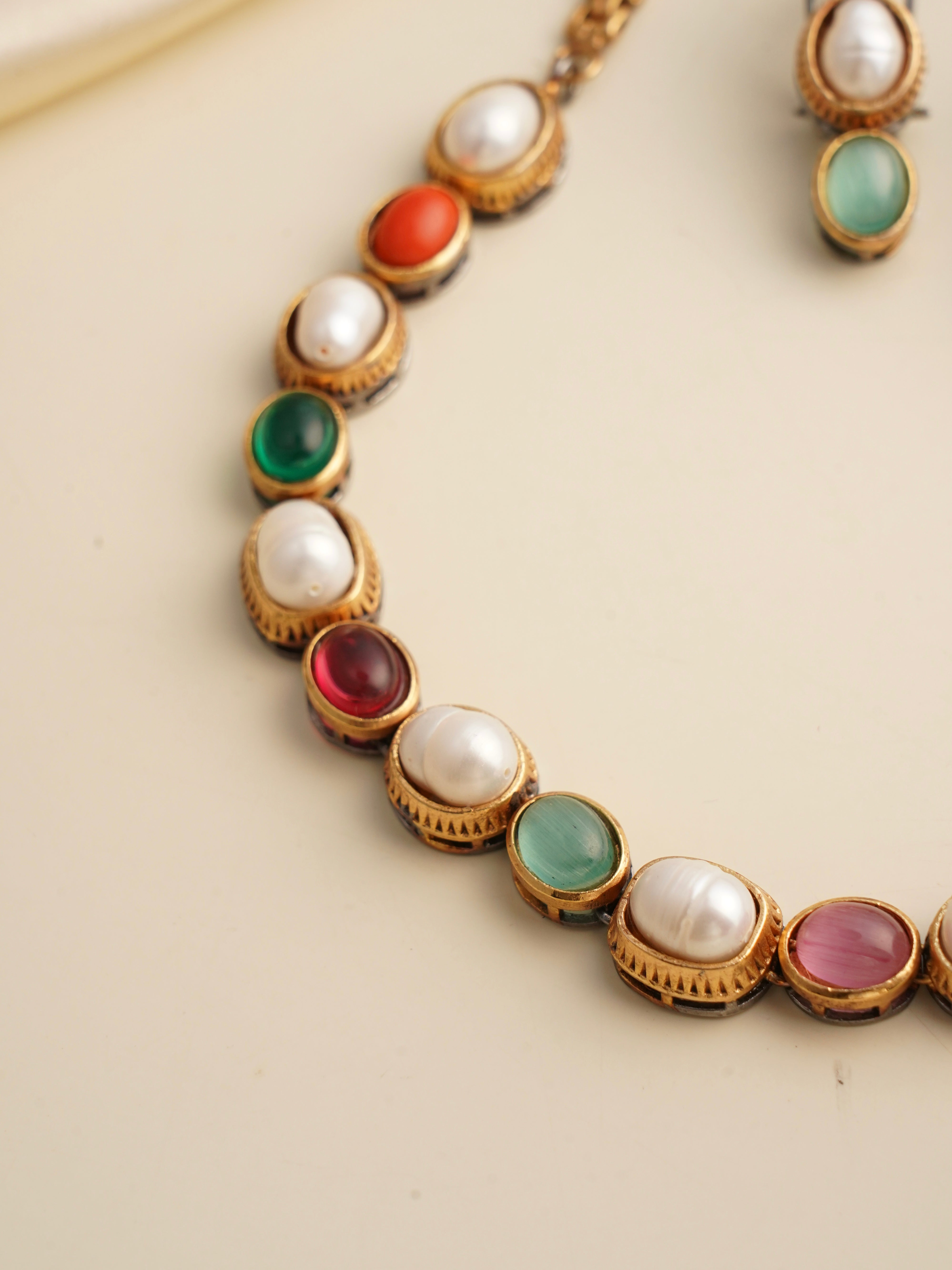 Side angle of gemstone and pearl necklace set with refined Sabyasachi-inspired design