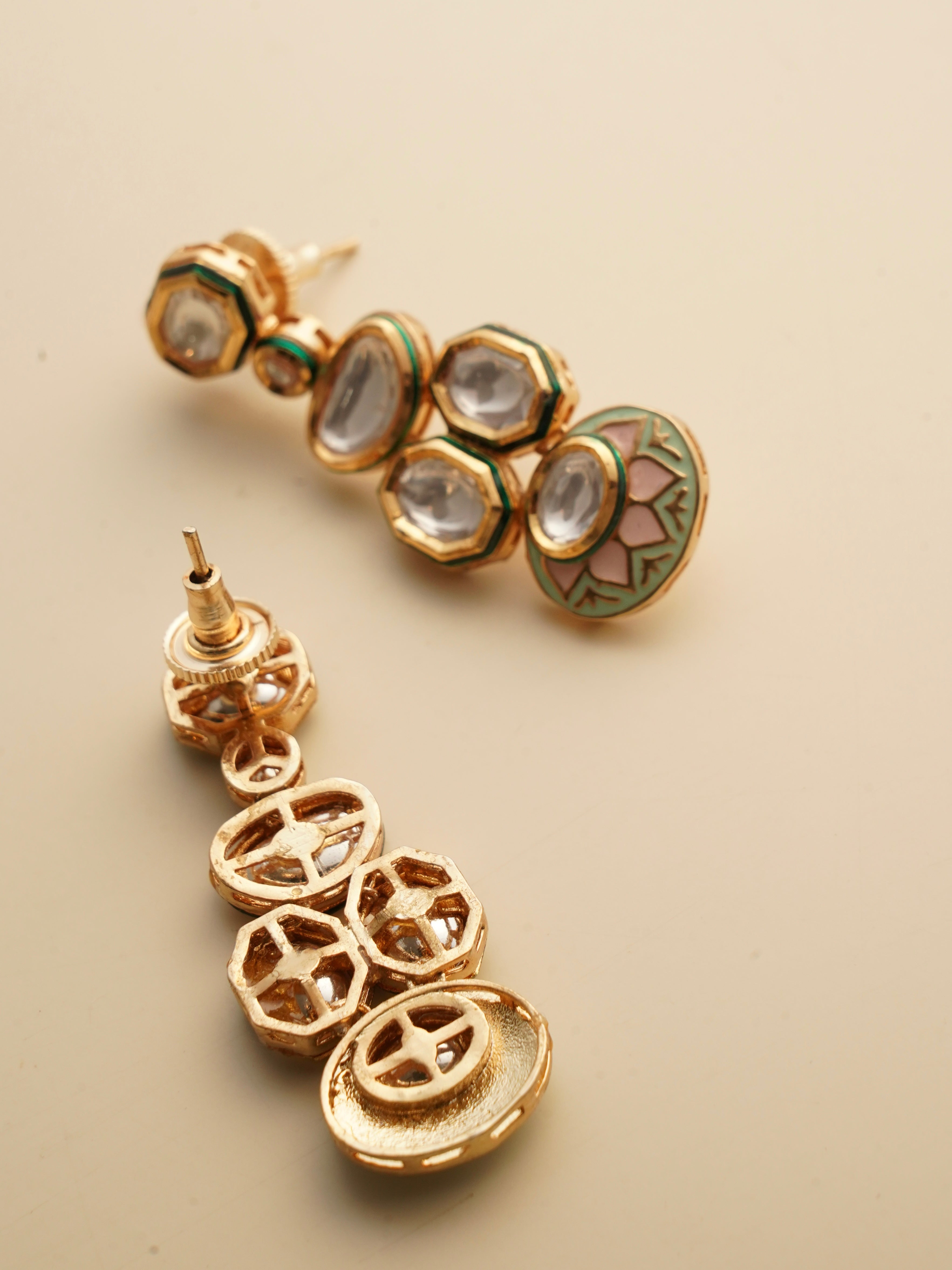 Angled front view of kundan necklace with enamel detailing and elegant finish