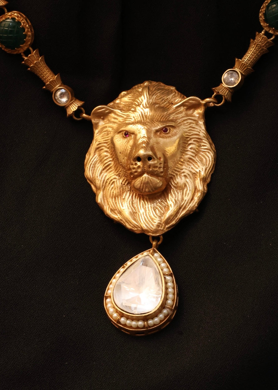 Rear detail of lion pendant necklace highlighting clasp and chain design