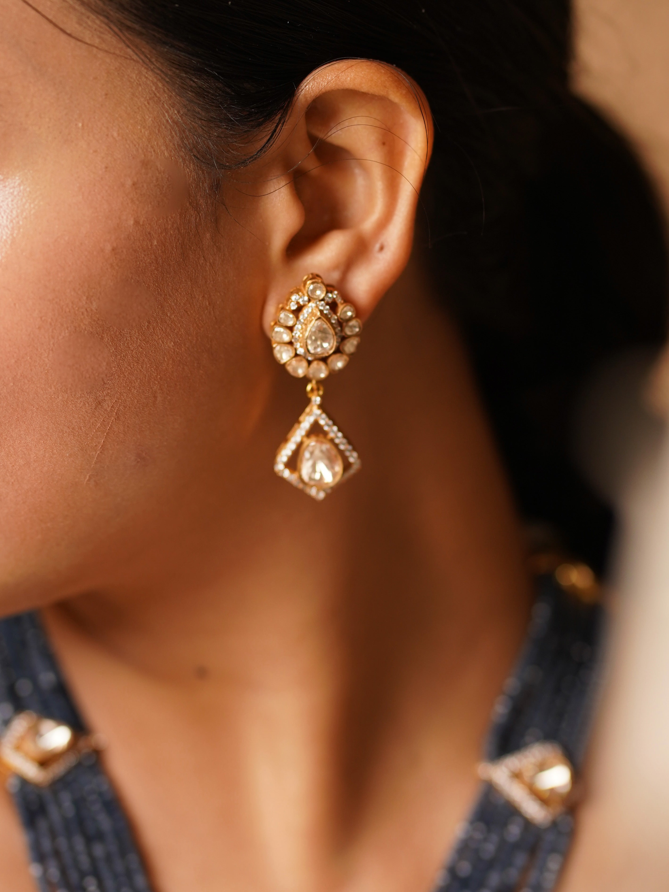 Close-up of enamelled lotus choker with kundan centre and pearl drops