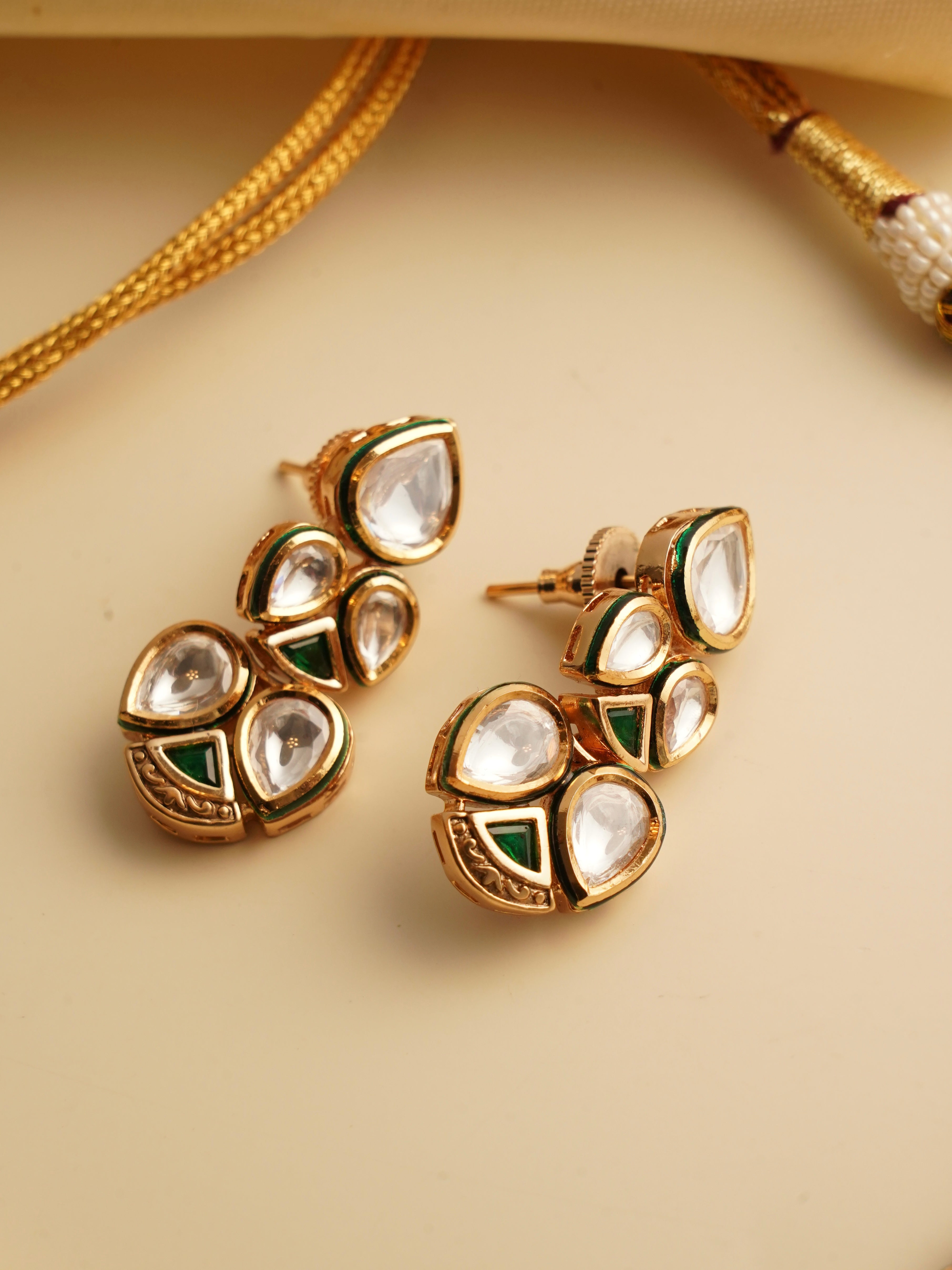 Backside of kundan necklace highlighting adjustable dori and enamel craftsmanship