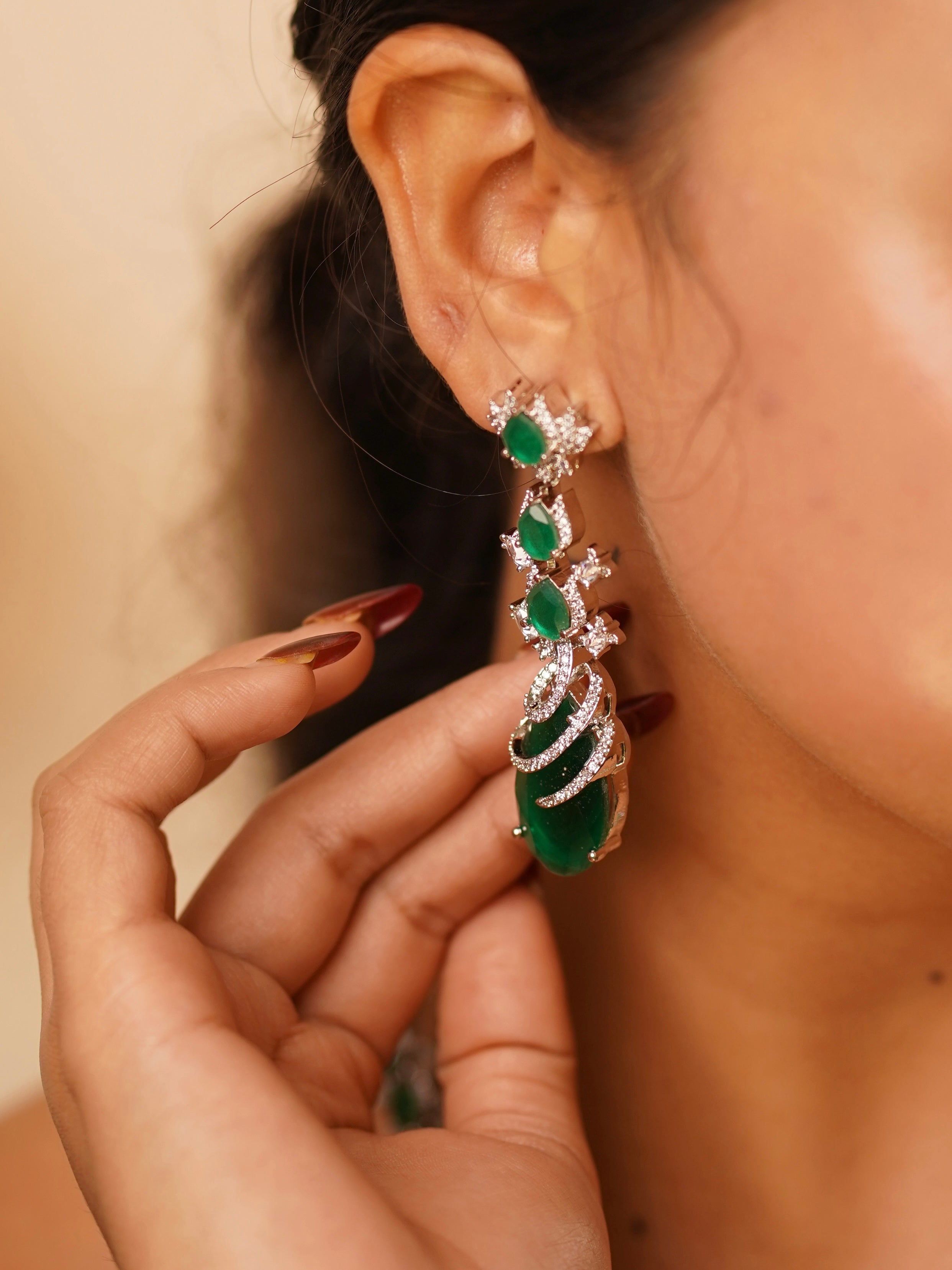 front angle of american diamond and ruby necklace in elegant festive styling