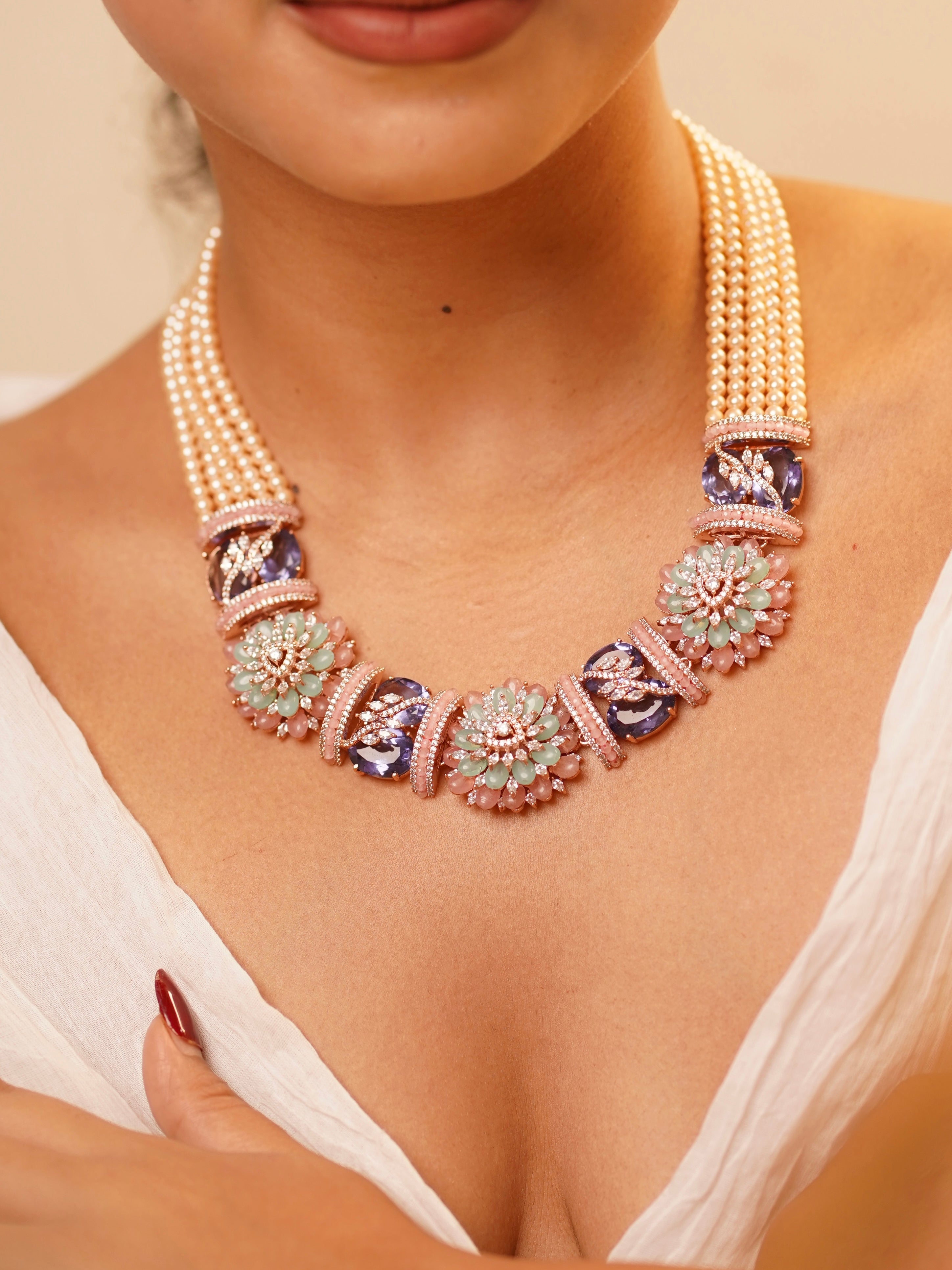 pearl beaded statement necklace set with diamond look and luxurious layered design