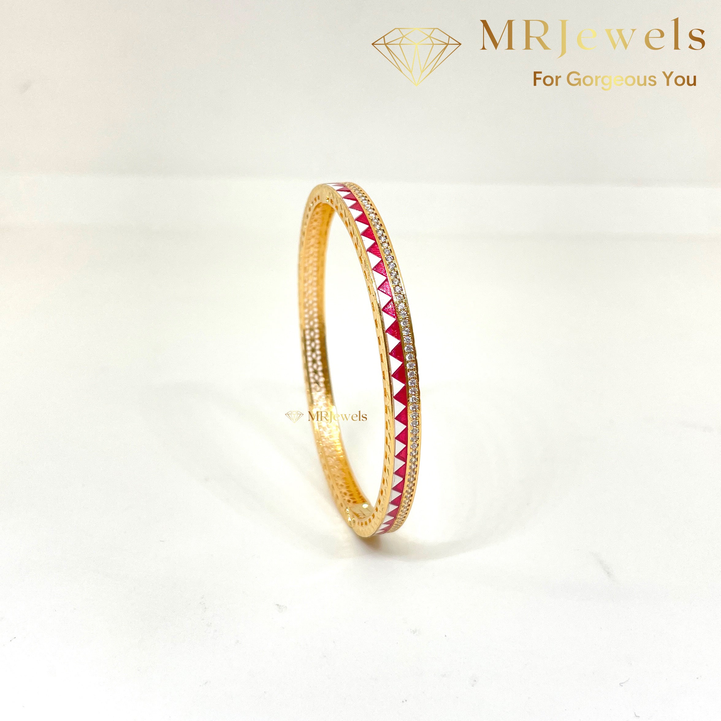 Close-up of bracelet’s openable hinge mechanism and gold-plated detailing