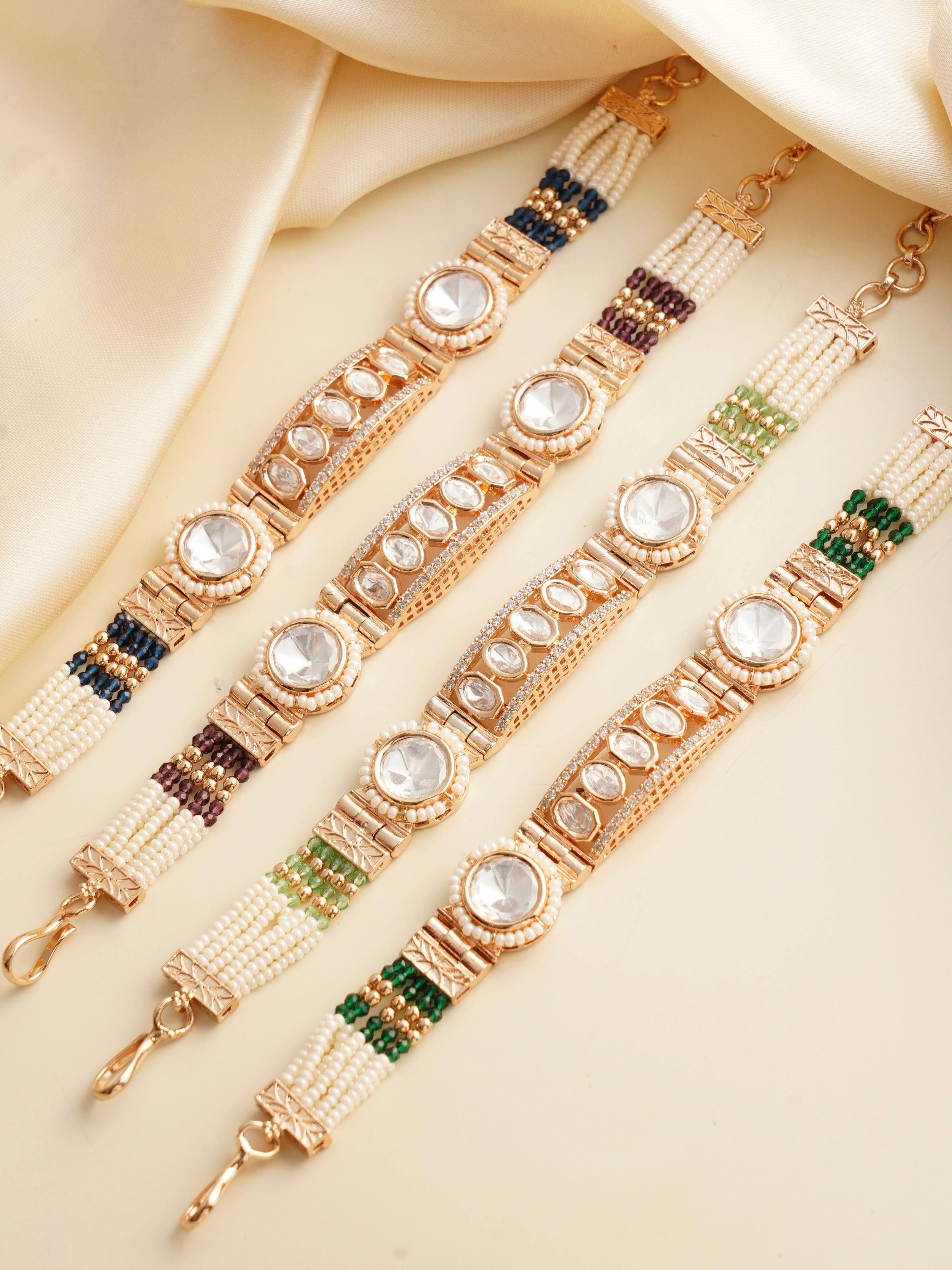 Kundan pearl rakhi bracelet with floral centre and gold accents