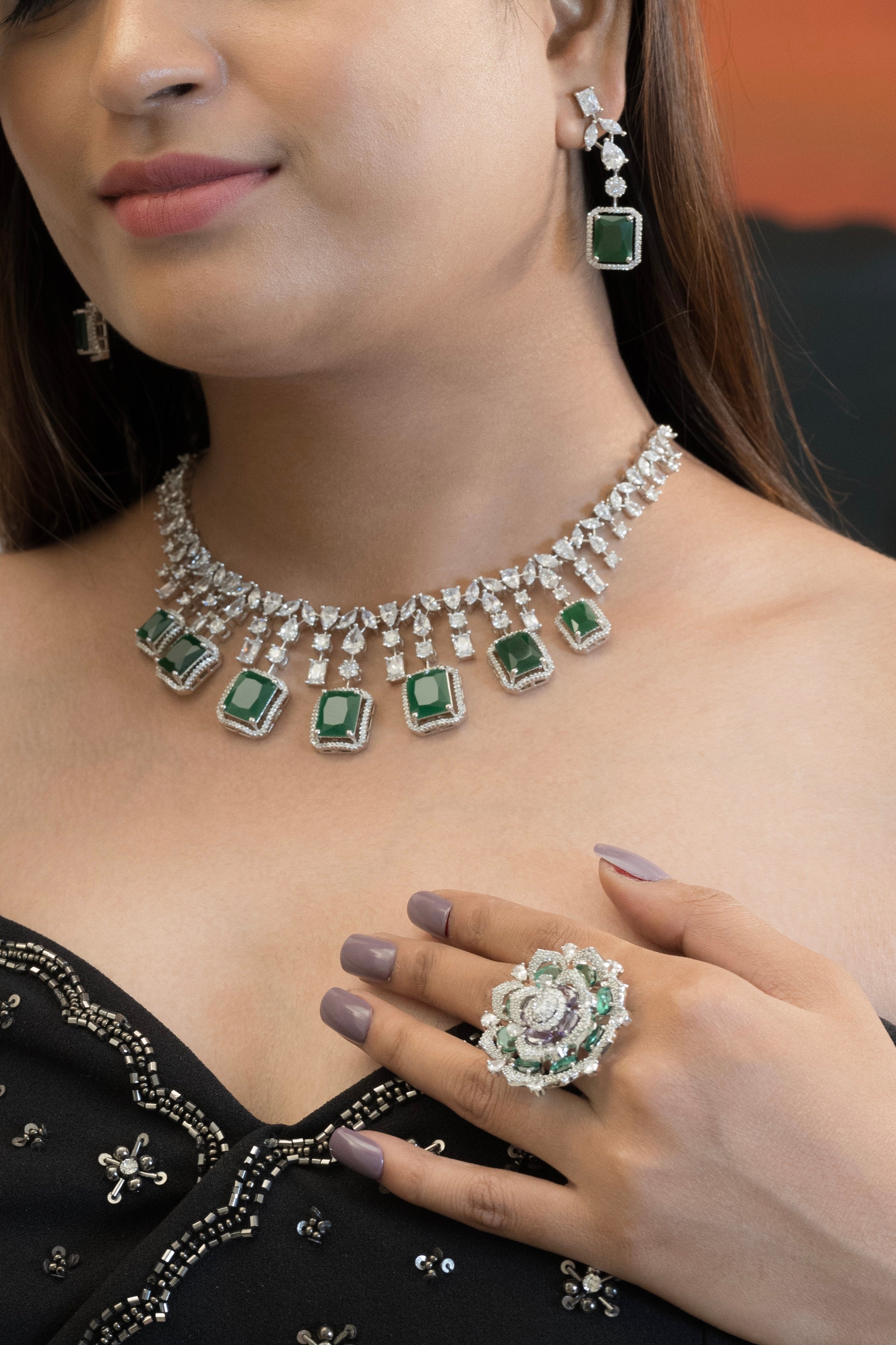 emerald and diamond necklace set in rhodium finish with matching earring pair