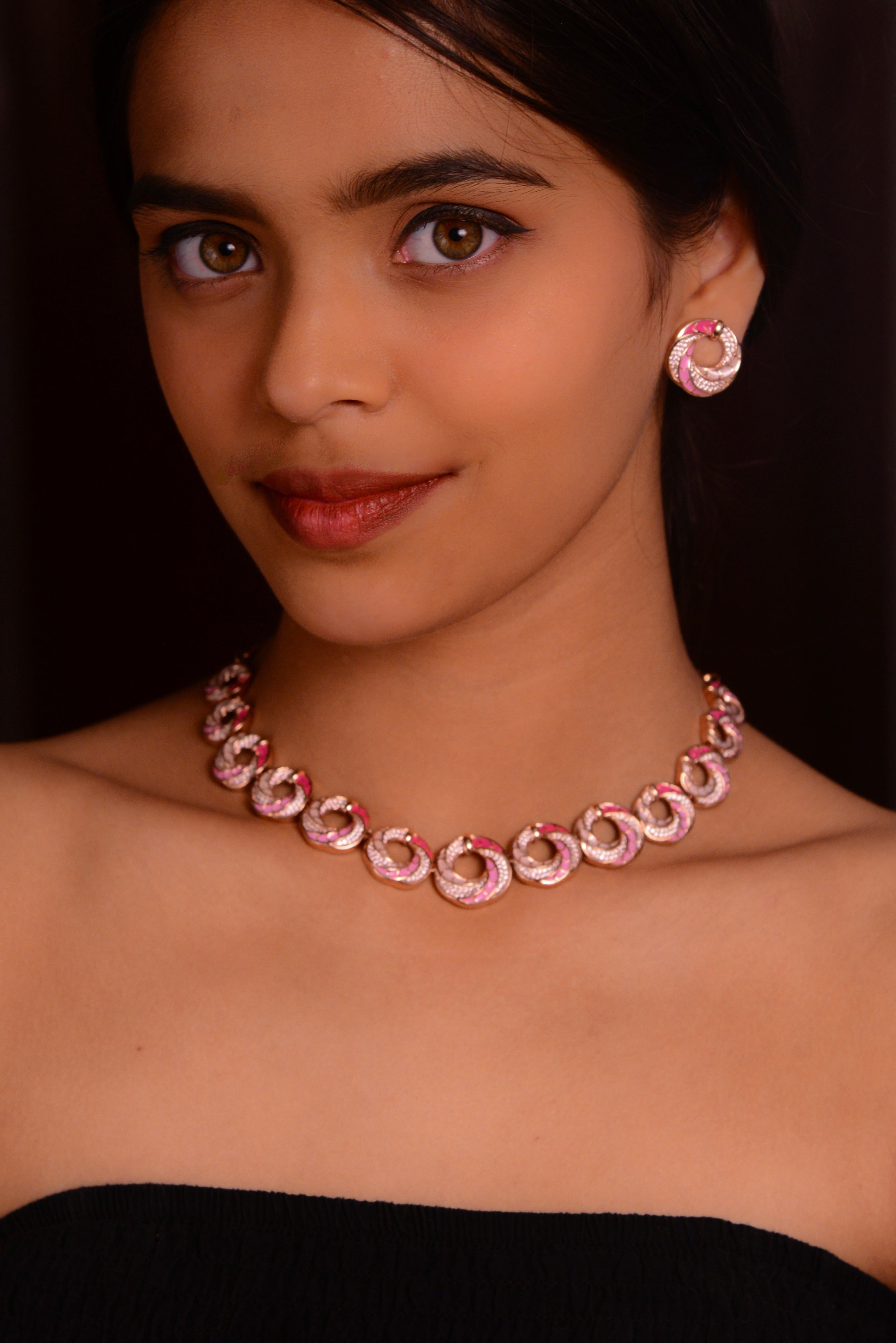 meenakari necklace set with pink and magenta circular motifs and crystal detailing