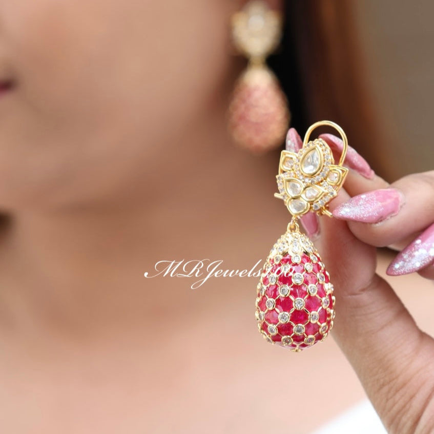 angled view highlighting the gold finish and intricate polki setting