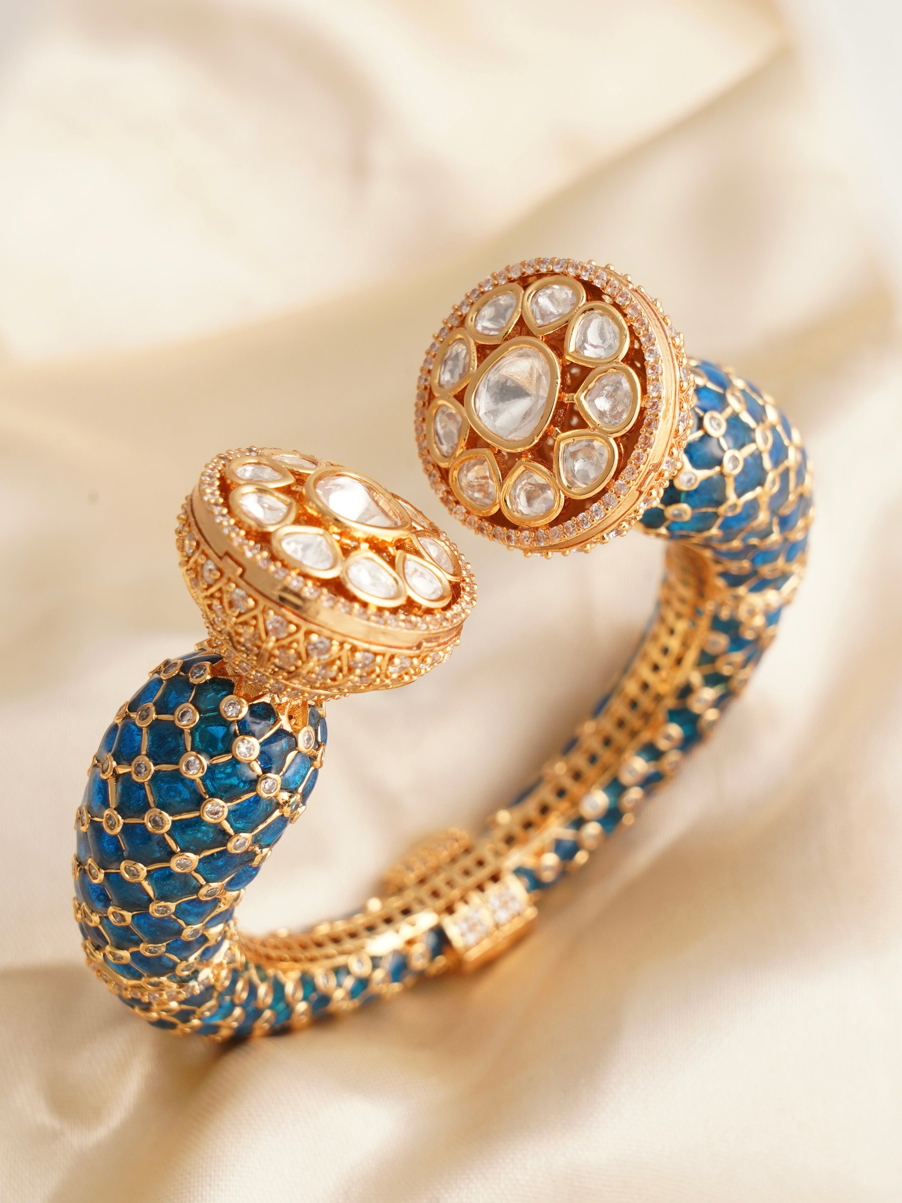 Side view of meenakari kada showing kundan work and shimmering cubic zirconia detailing