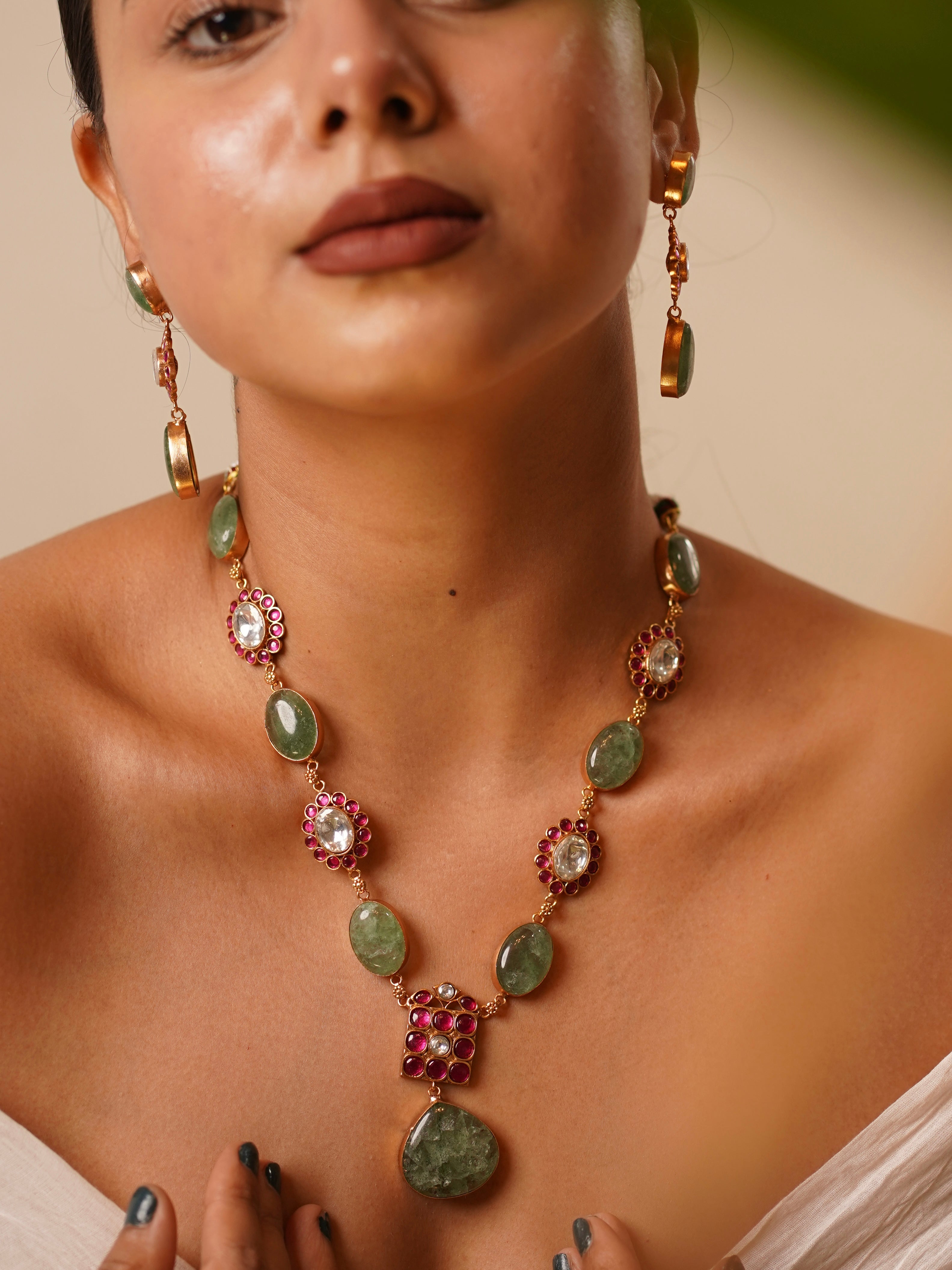 close-up of kundan necklace set showcasing kabachino stones and ruby accents