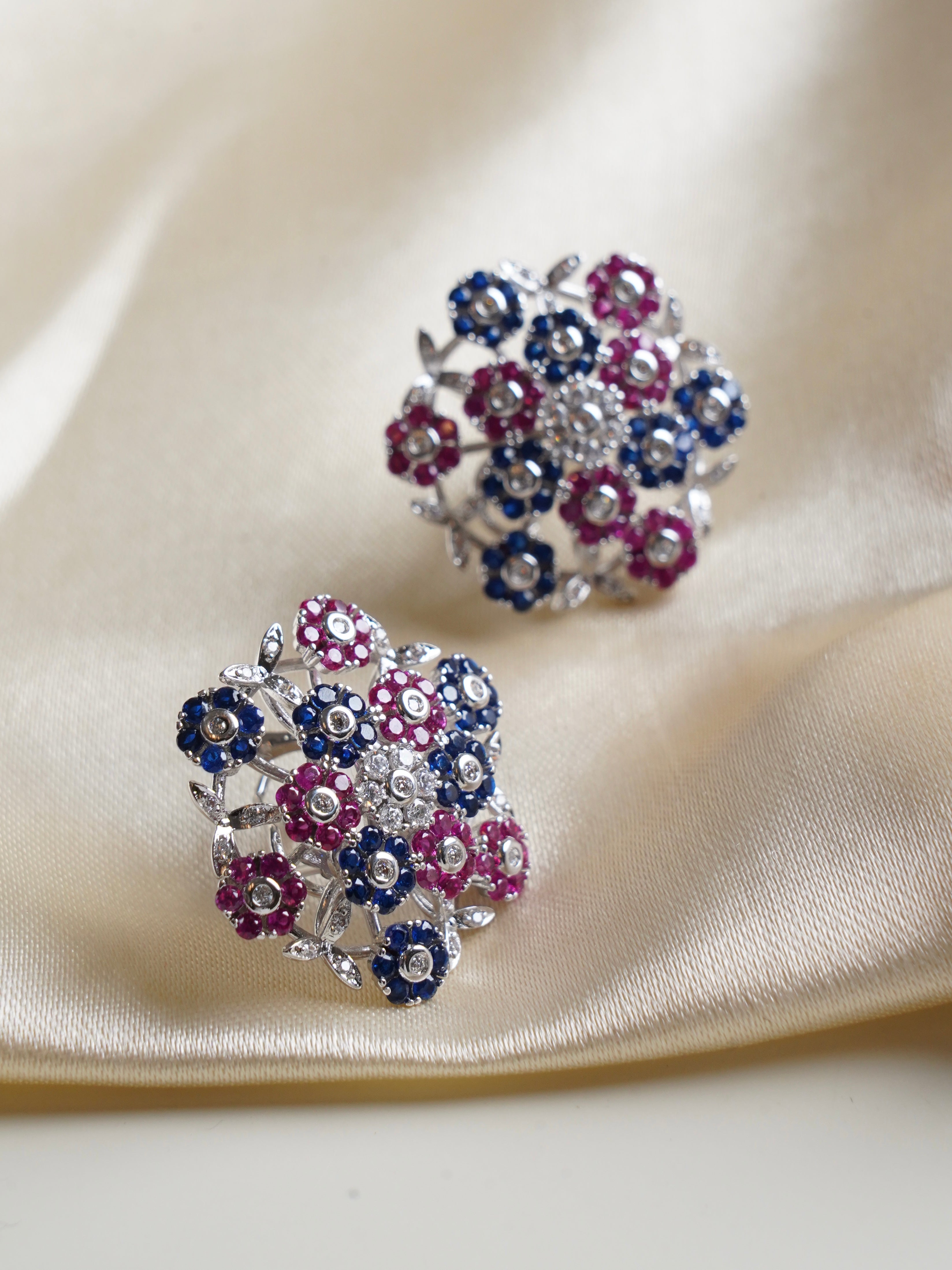 Seraphina fleur constellation studs with clusters of blue and pink cubic zirconia flowers on silver tone