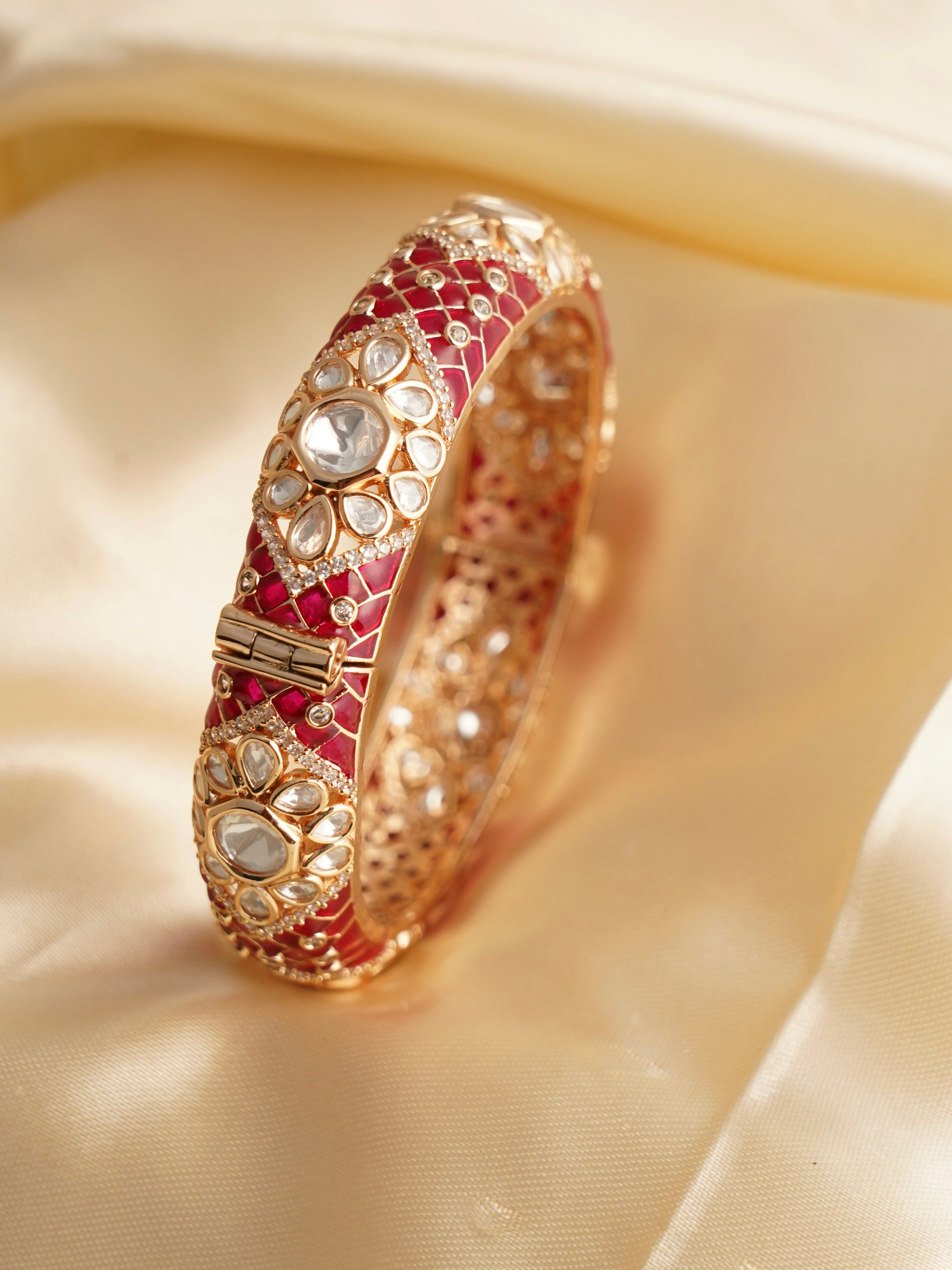 Side angle of kundan bangles showing enamel detailing and polki accents