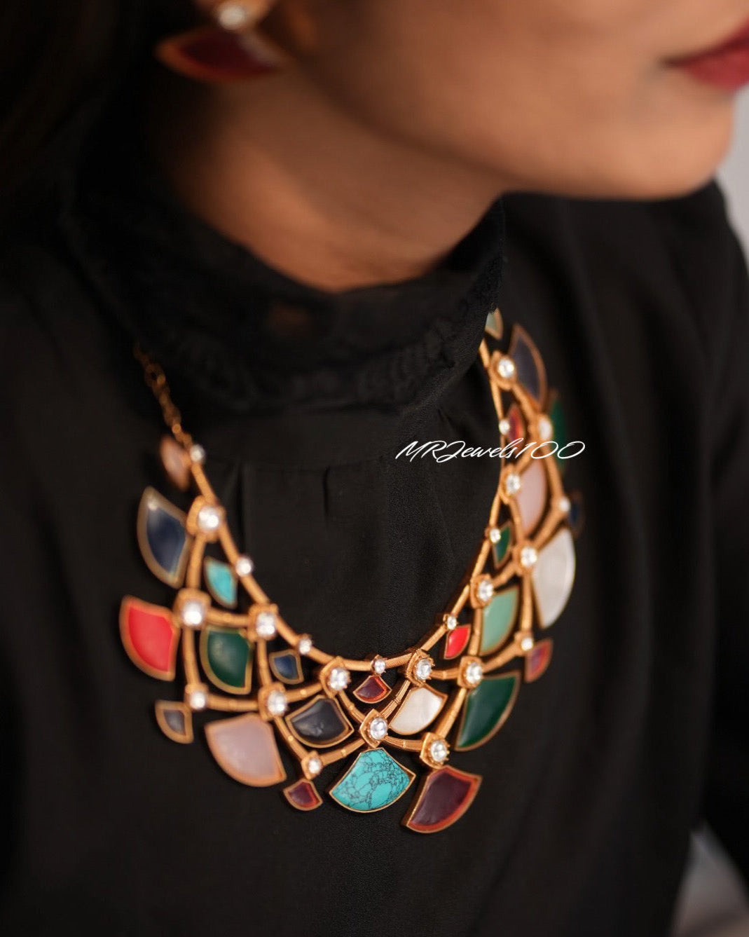 Mosaic jewellery set with crystal and matte gold finish in modern ethnic styling