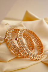 Pair of openable uncut polki bangles with cluster design and micron gold finish