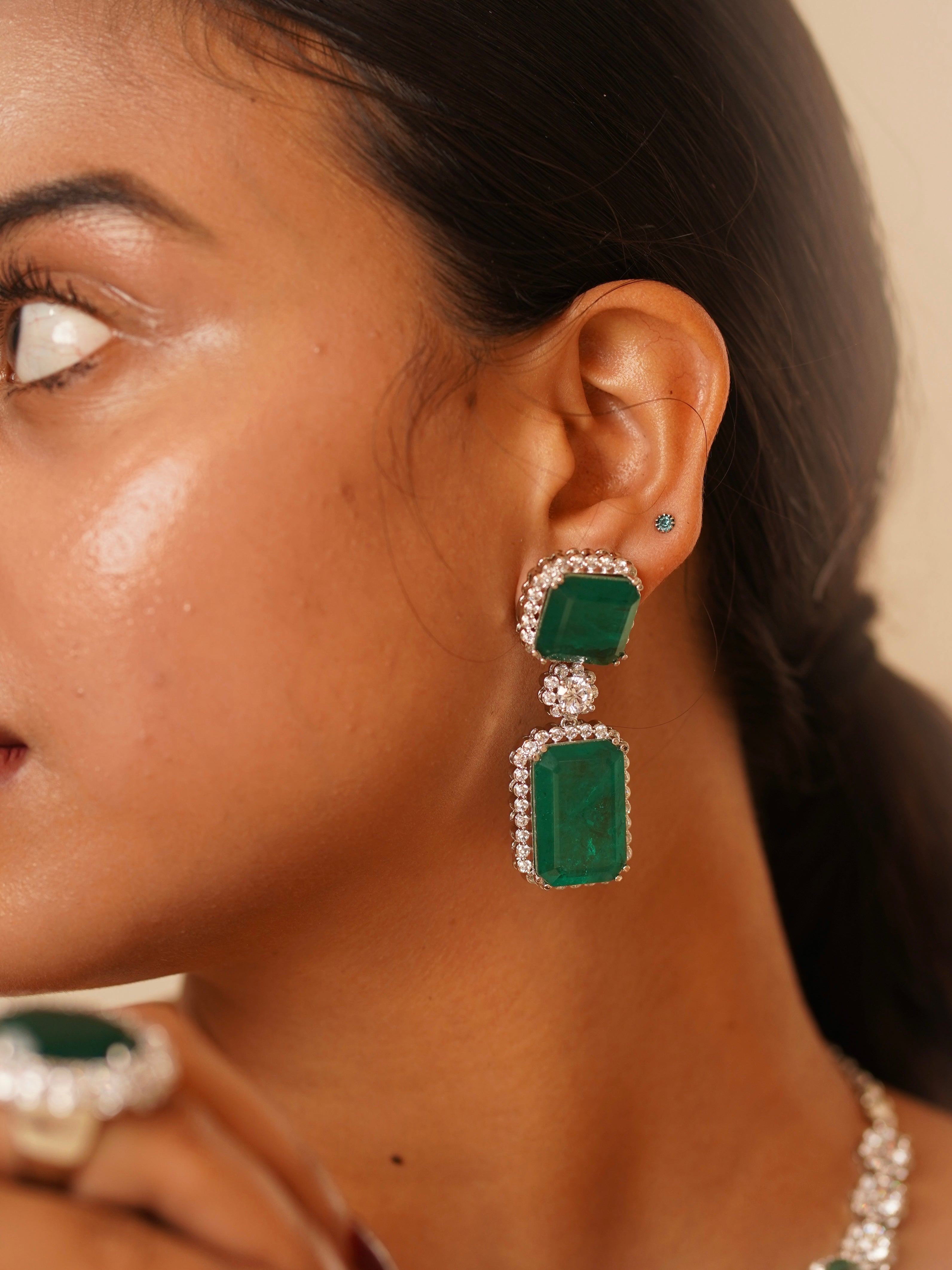 Necklace with cascading emerald drops and CZ links for a luxe designer finish