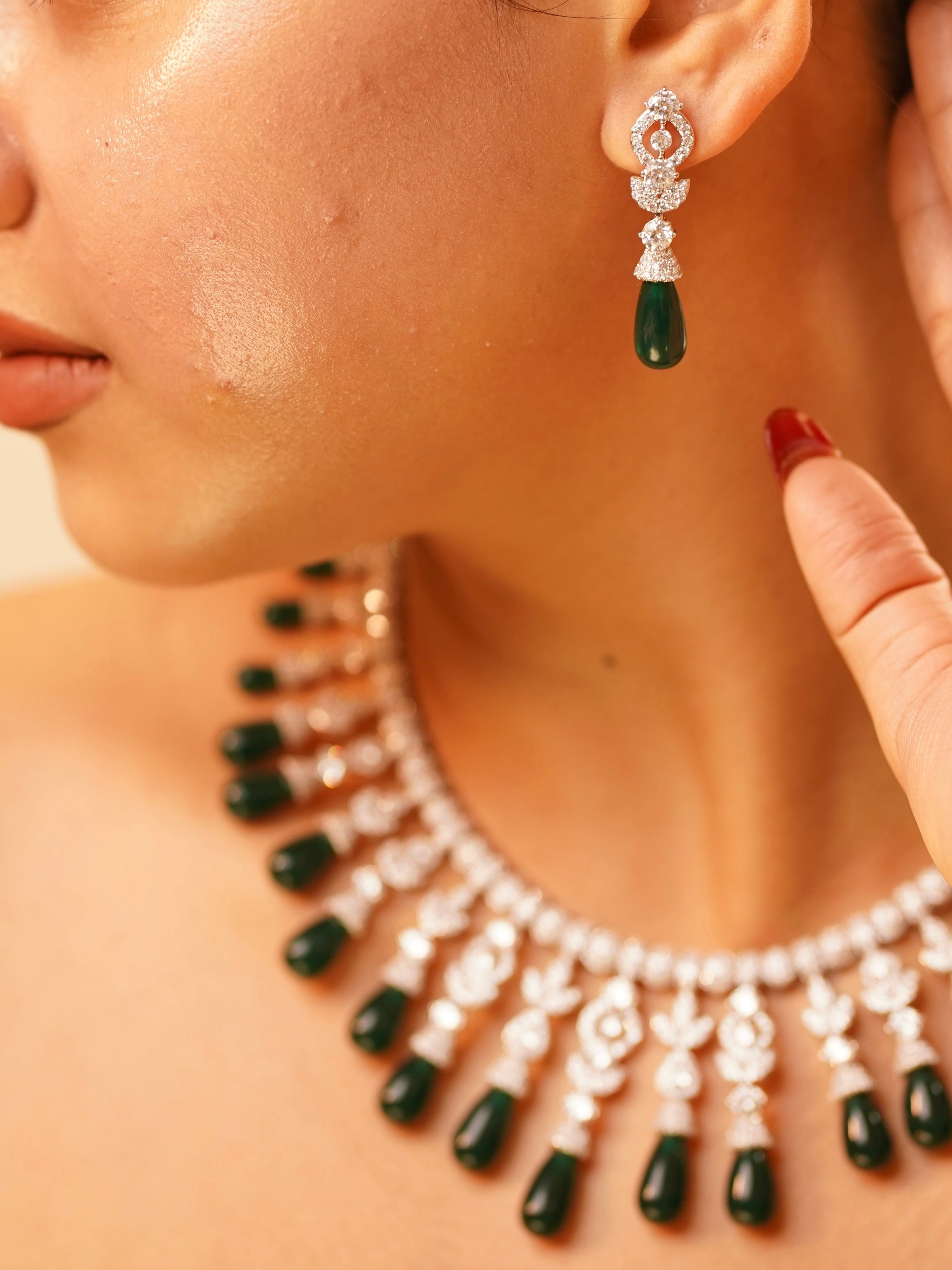 Designer necklace with ruby drops and precision CZ cascade for bold glamour