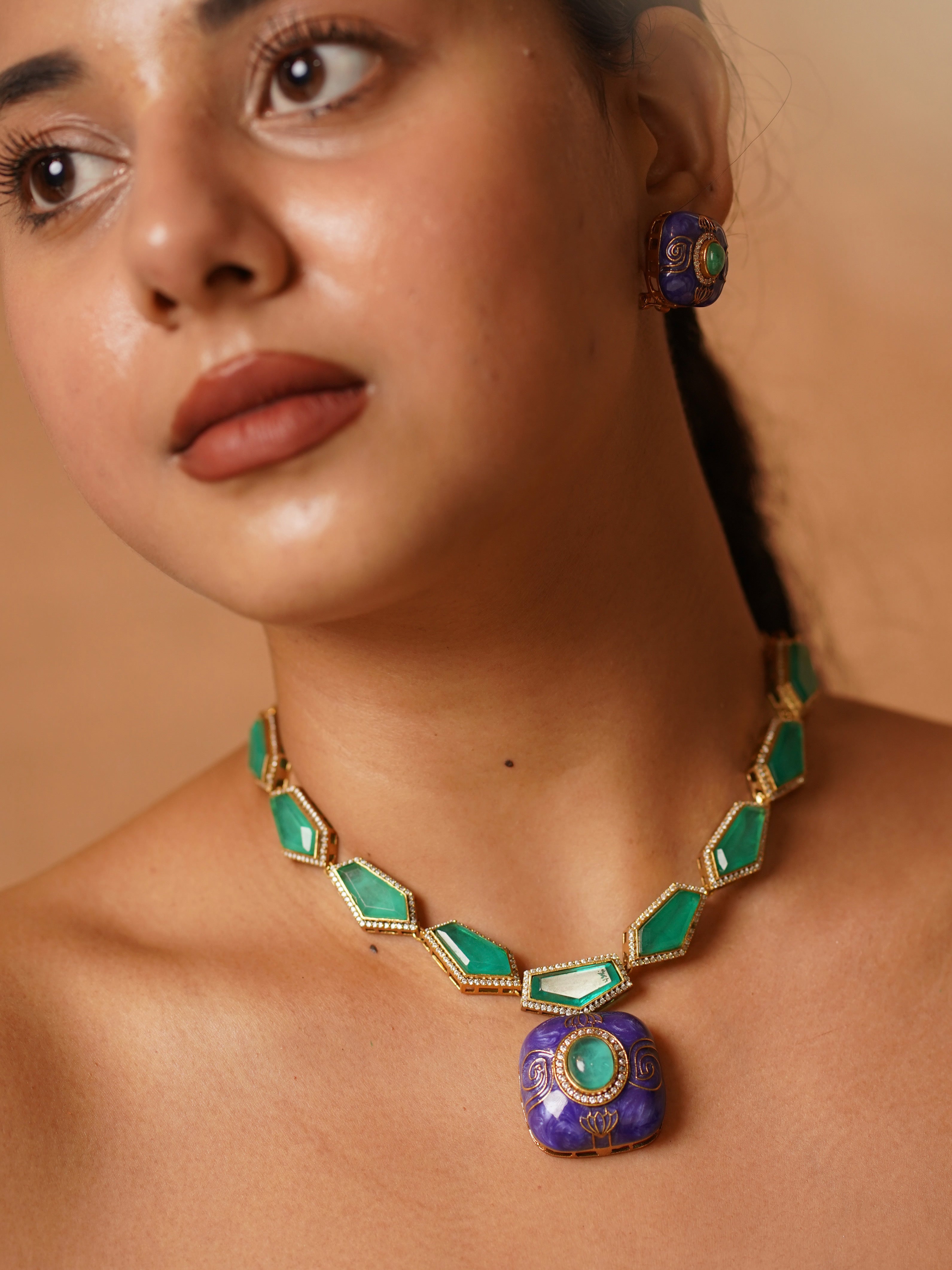 Emerald-cut green stone necklace with lavender meenakari pendant and gold-plated studs