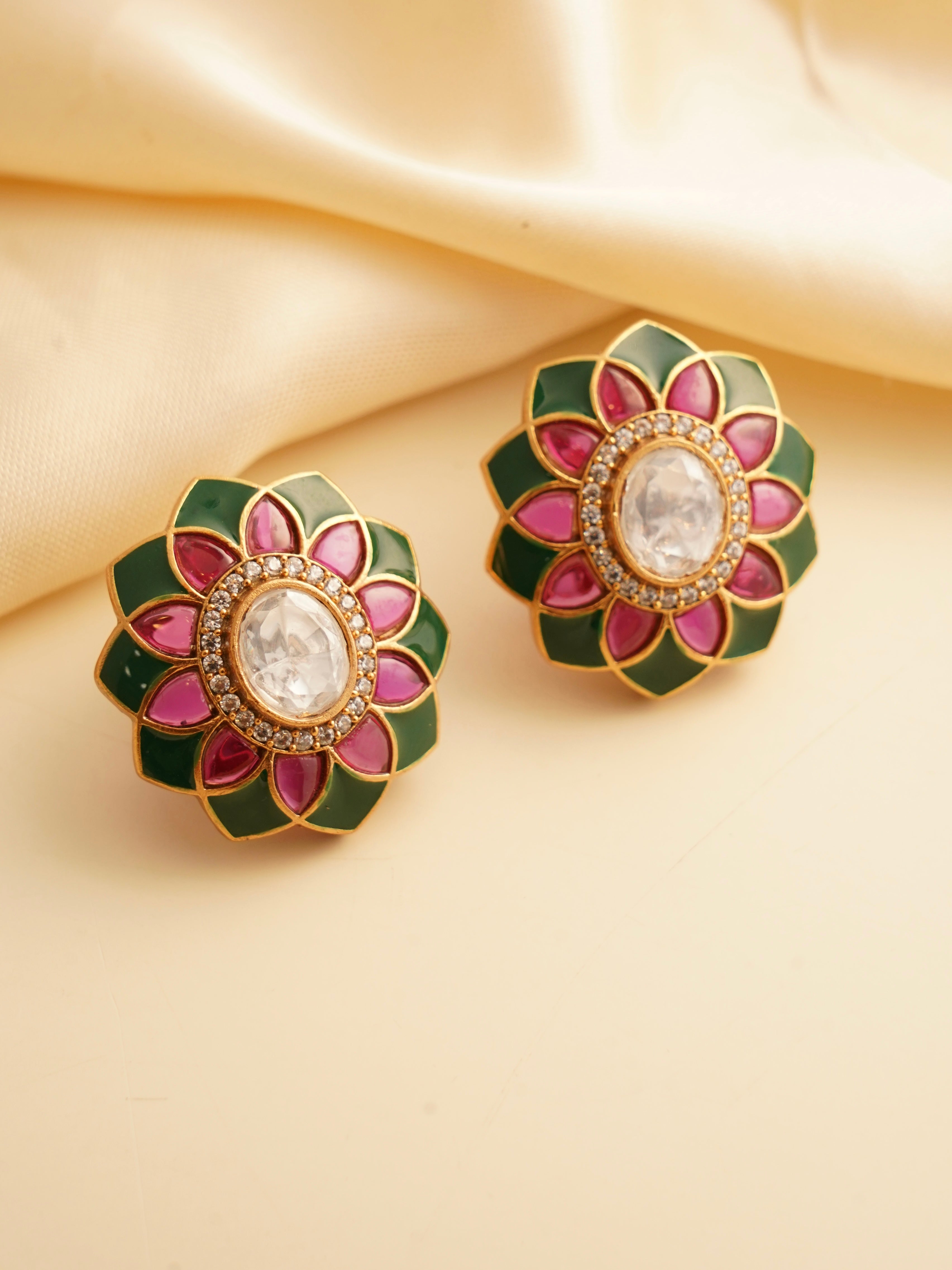 Polki flower studs with fuchsia pink and emerald green enamel petals and central uncut stone