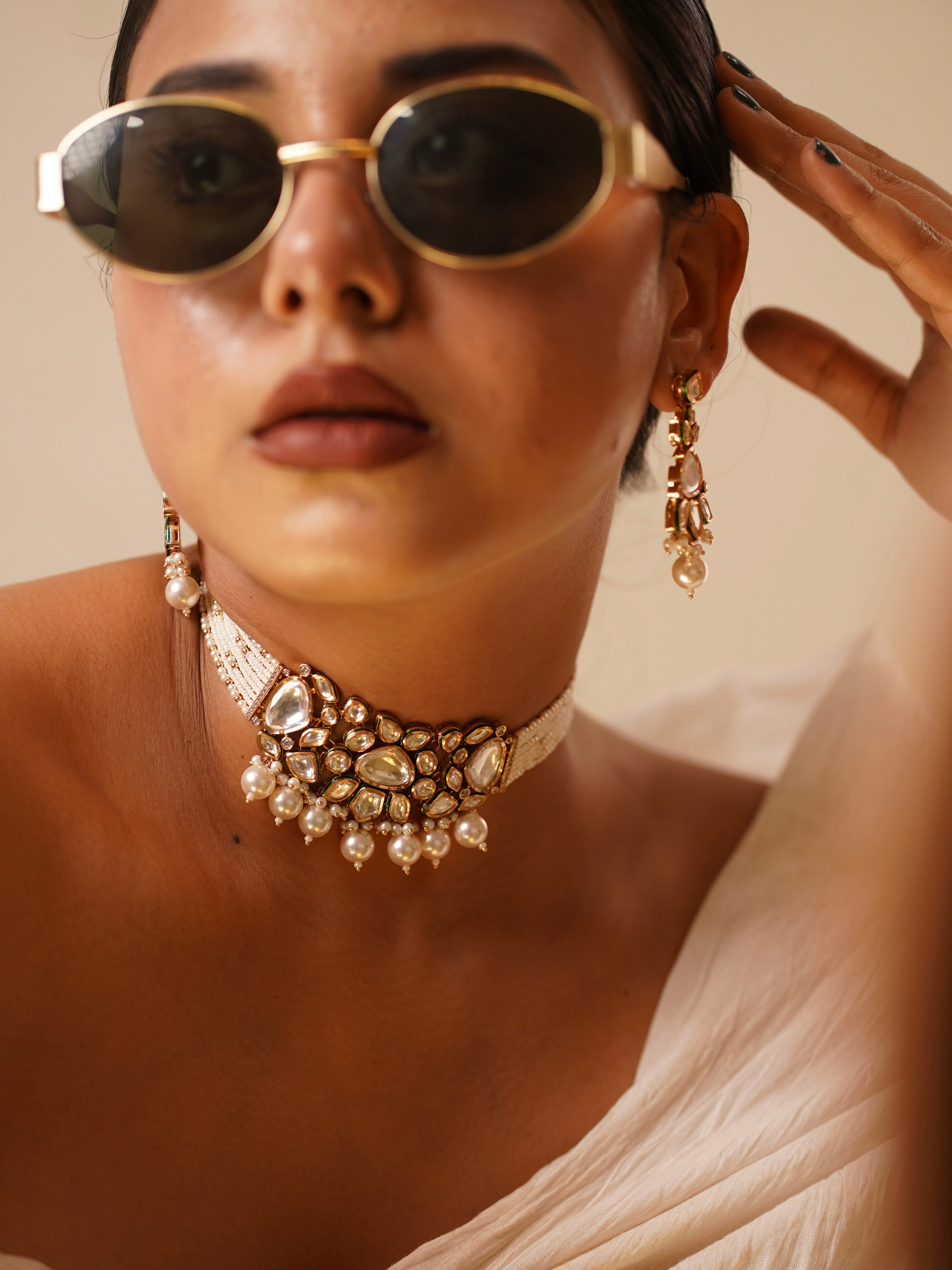 Side view of Nooré choker set showing pearl strands and kundan-style centrepiece