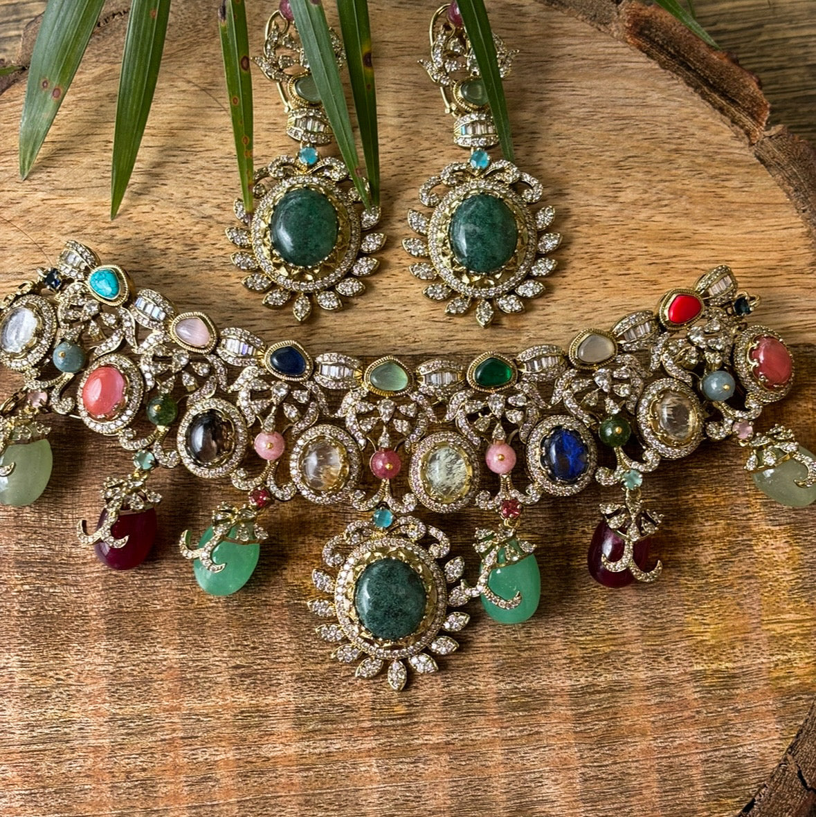 Front view of heritage choker necklace with stone-encrusted centerpiece and intricate design