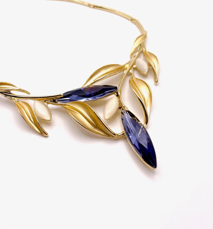 Front view of aurora vine crystal set featuring delicate curves and embedded stones