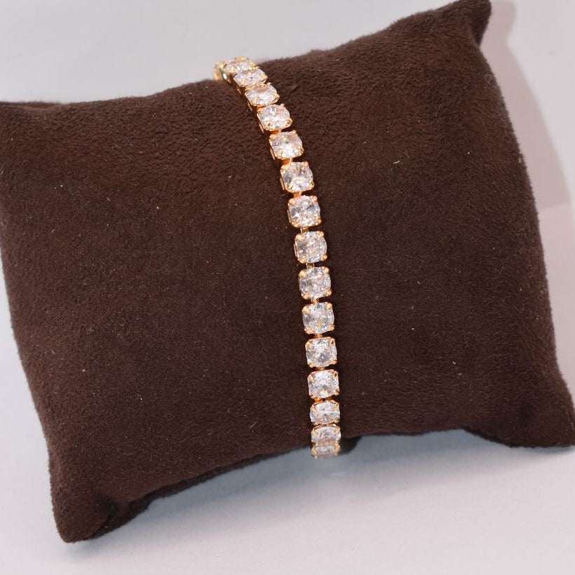 Classic diamond tennis bracelet with prong-set stones and elegant gold links
